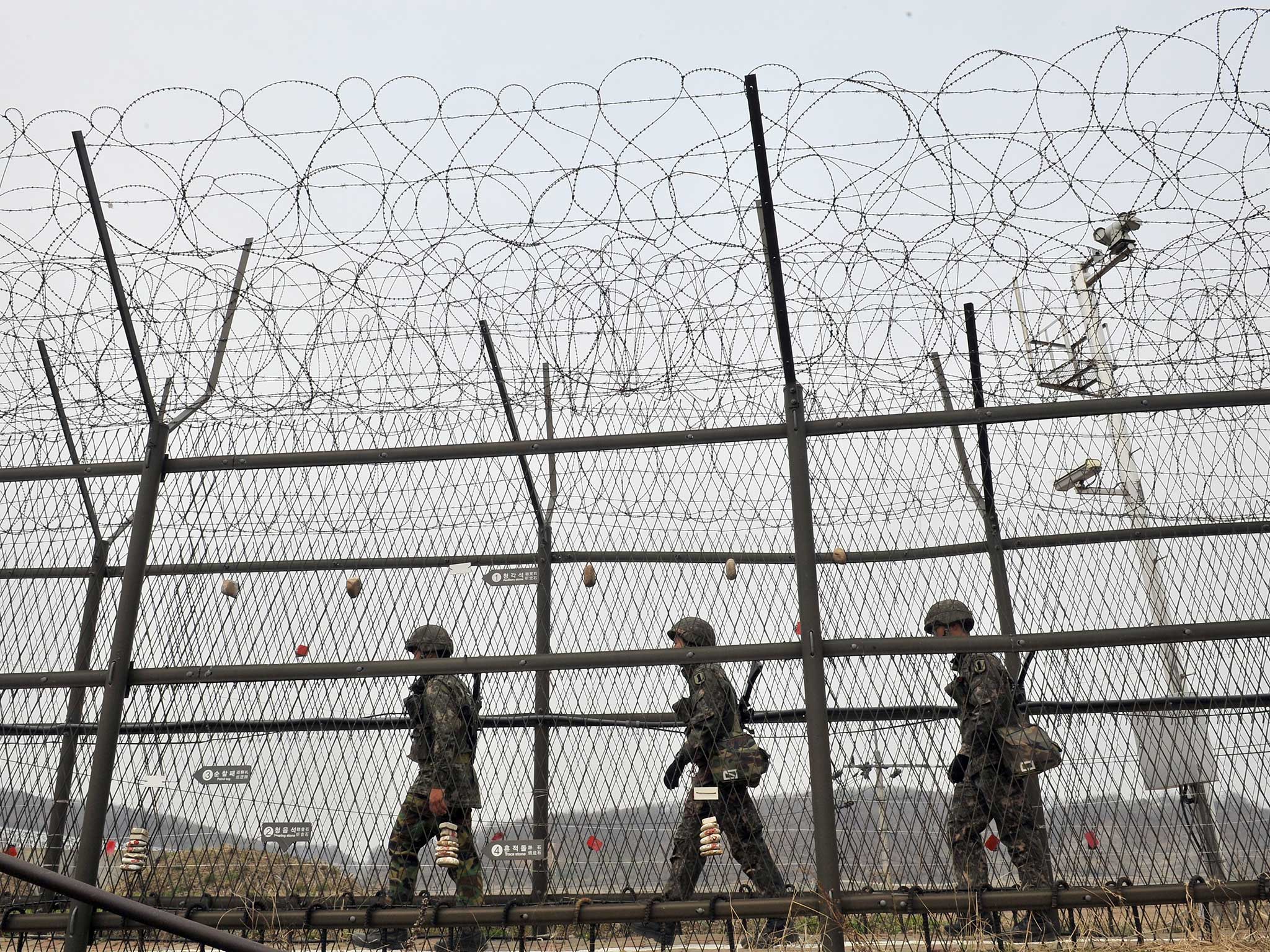 Soldiers patrol the demilitarised zone separating North and South Korea
