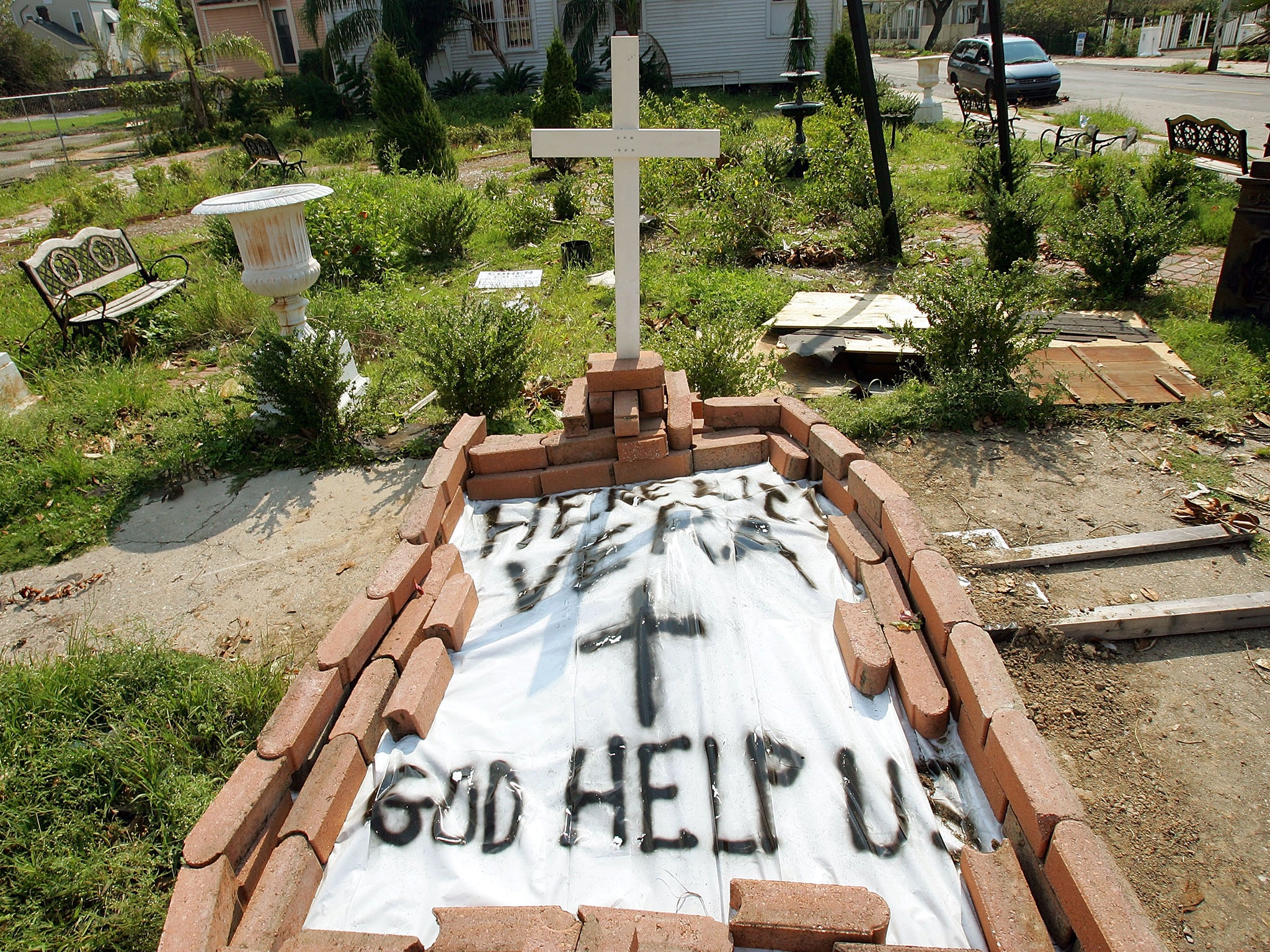 A makeshift grave is seen for a woman on a downtown street in New Orleans, Louisiana, 2005