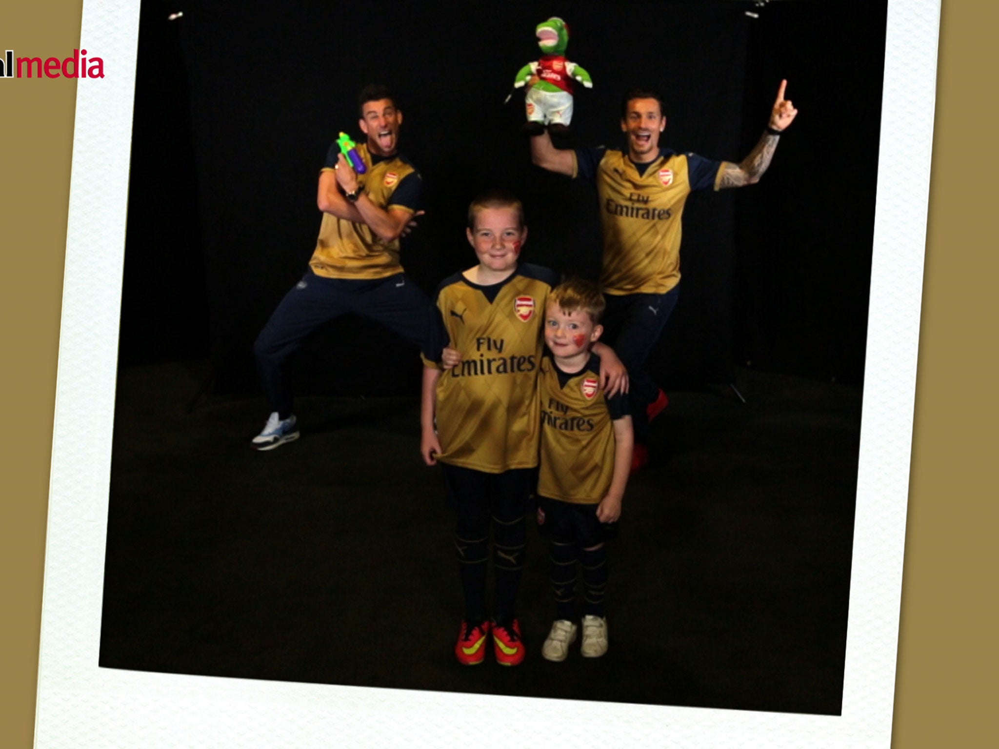 Laurent Koscielny and Mathieu Debuchy photobomb fans