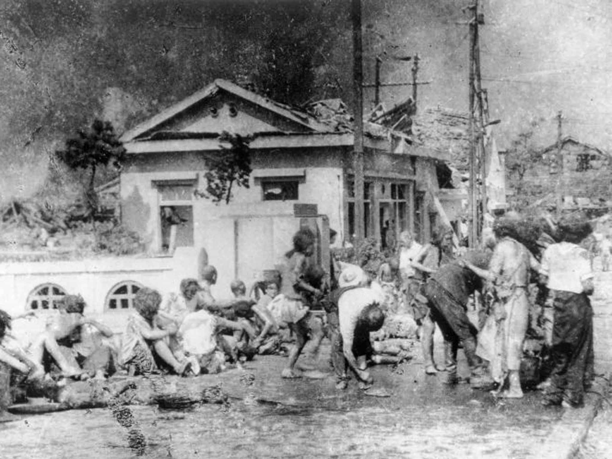 Survivors wait for medical treatment