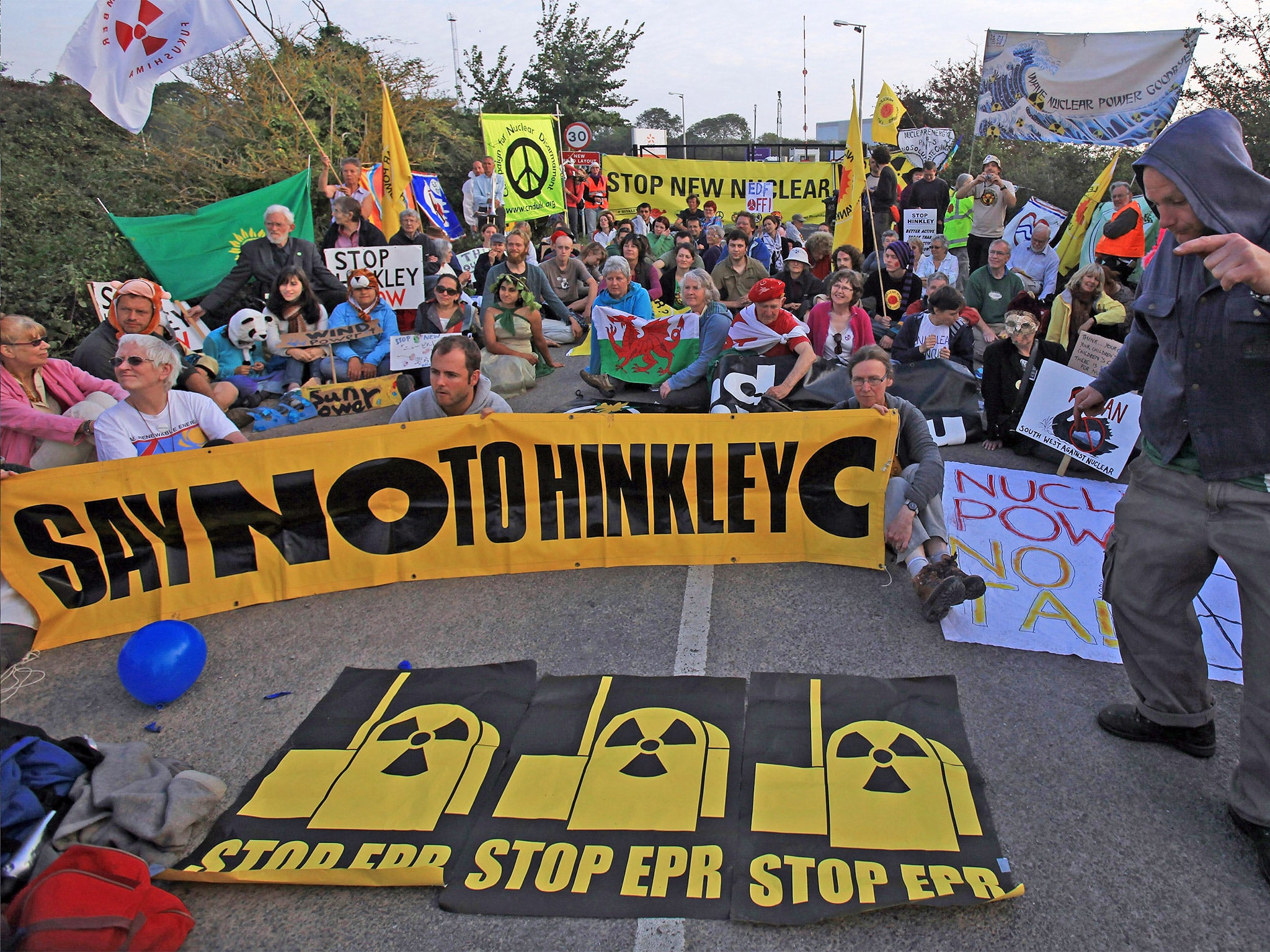 Anti-nuclear protesters gather at the gates of Hinkley Point nuclear power station in Bridgwater, in 2011 (Getty)