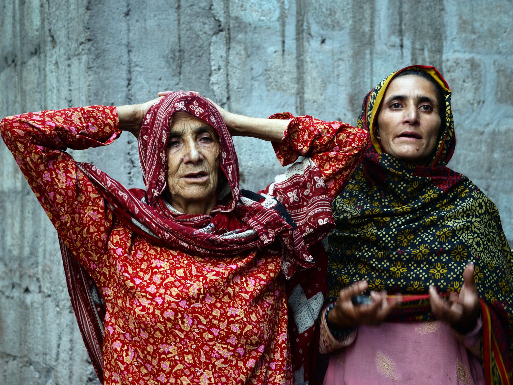 Shafqat Hussain’s mother, Makhni Begum (left) and his sister Sumaira Bibi after his execution in Muzaffarabad, Pakistan