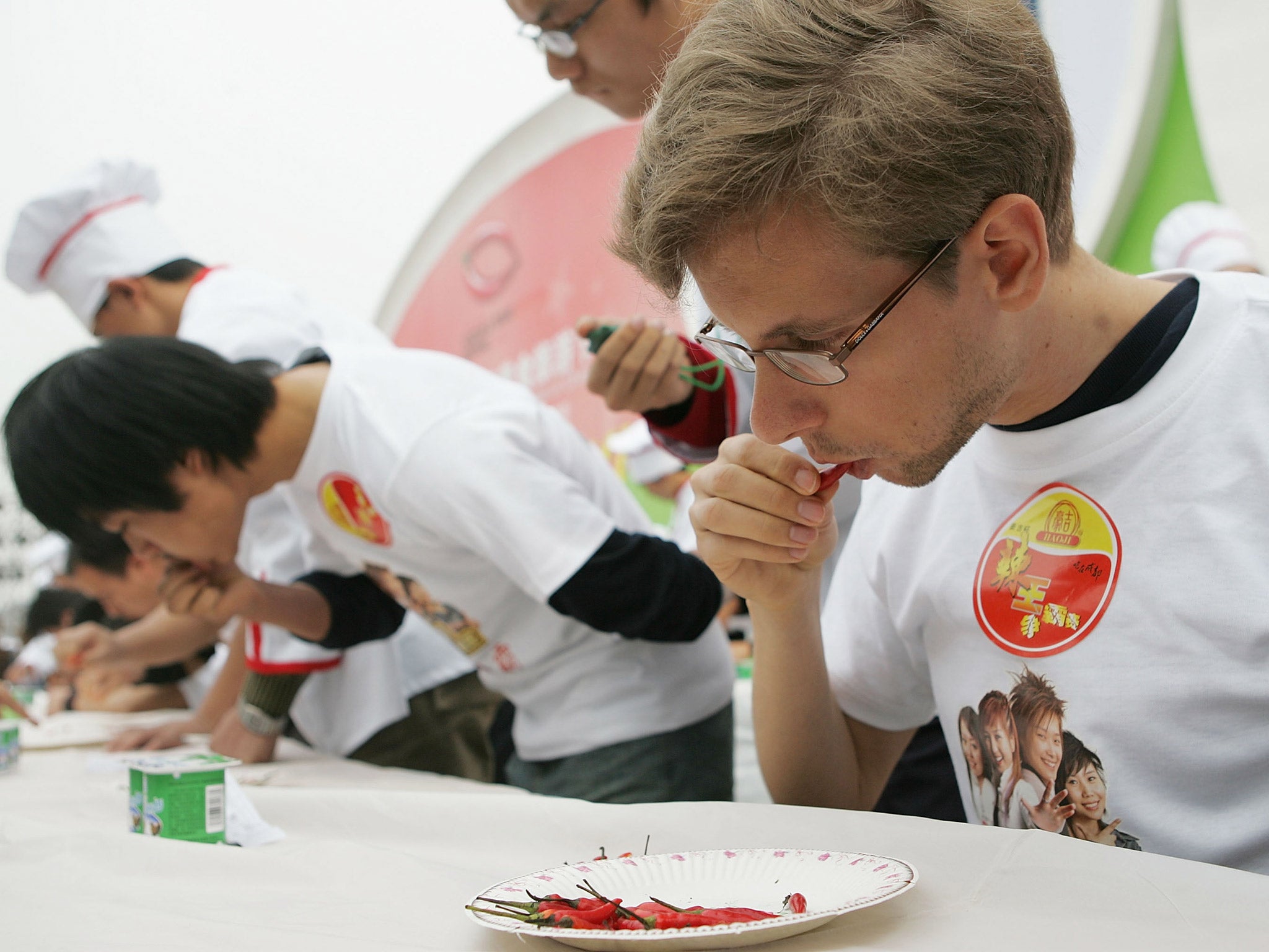 Competitors at a spicy-food-eating event in China