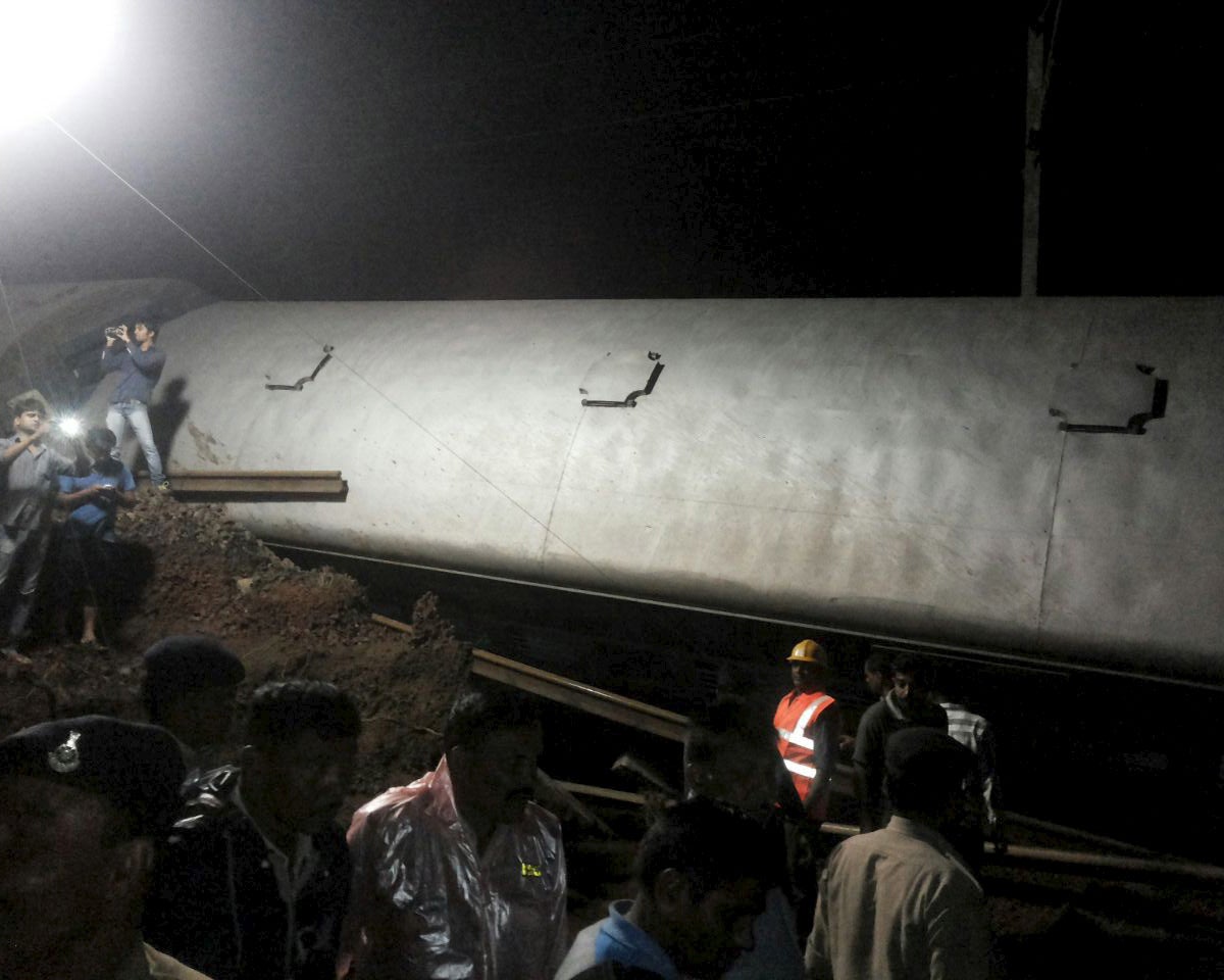 Rescue workers and railway official at the crash site in Madhya Pradesh