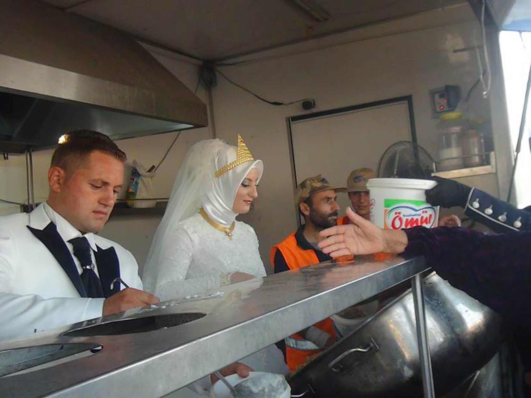 The wedding guests banded together to serve the food