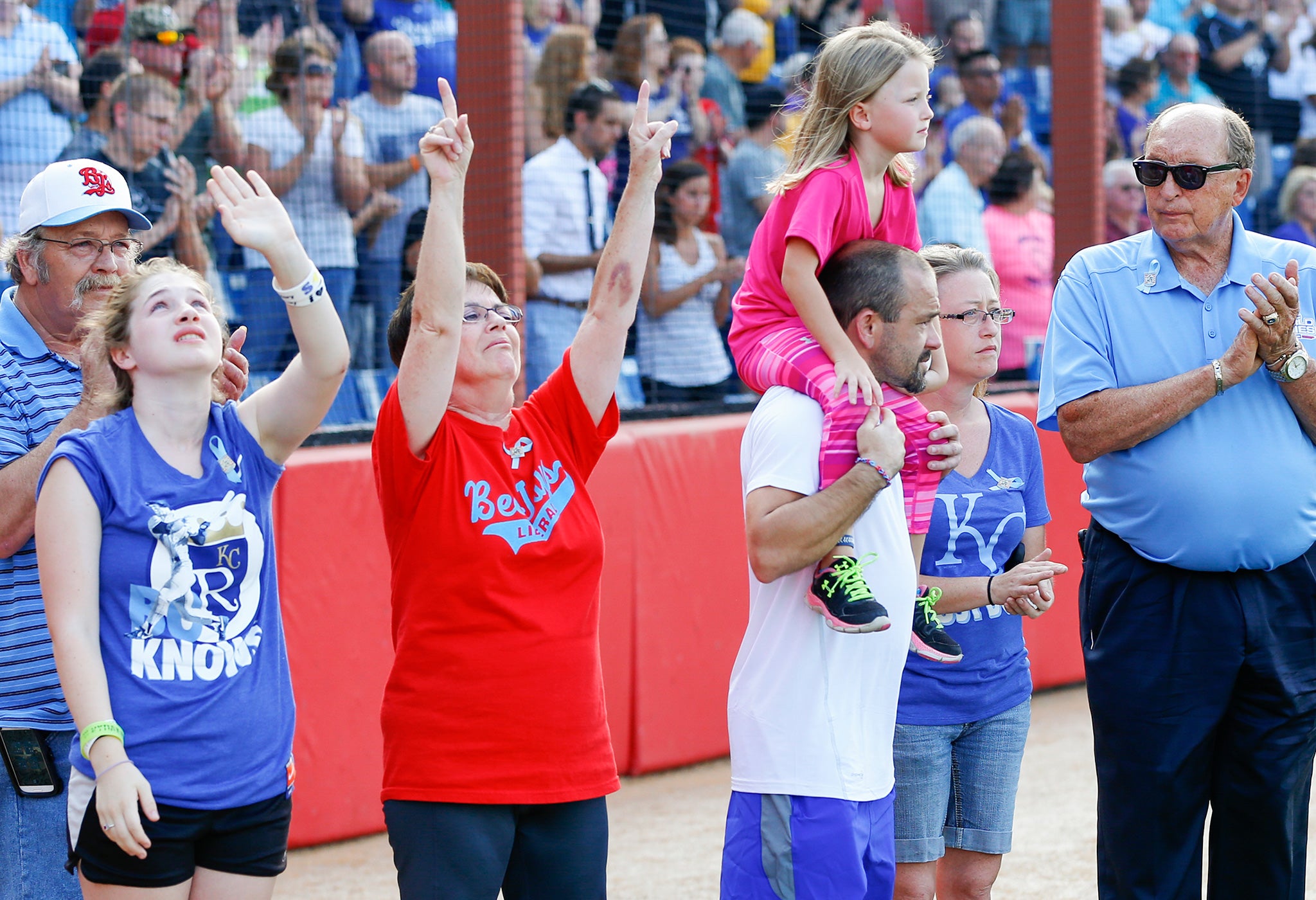 Carlile's family honor his memory prior to a baseball game between the Liberal Bee Jays and the Seattle Studs