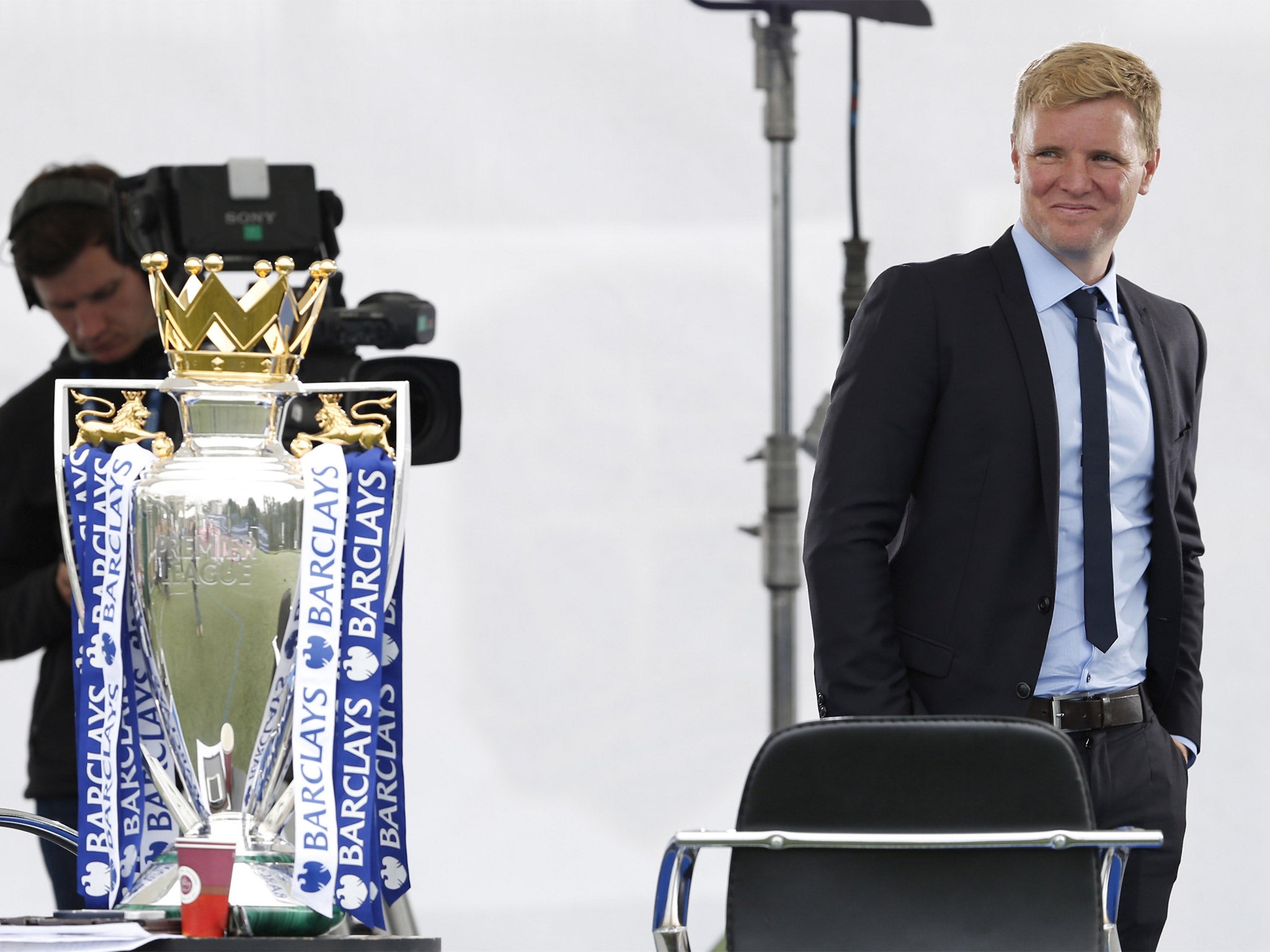 Bournemouth manager Eddie Howe sneaks a glance at the Premier League trophy