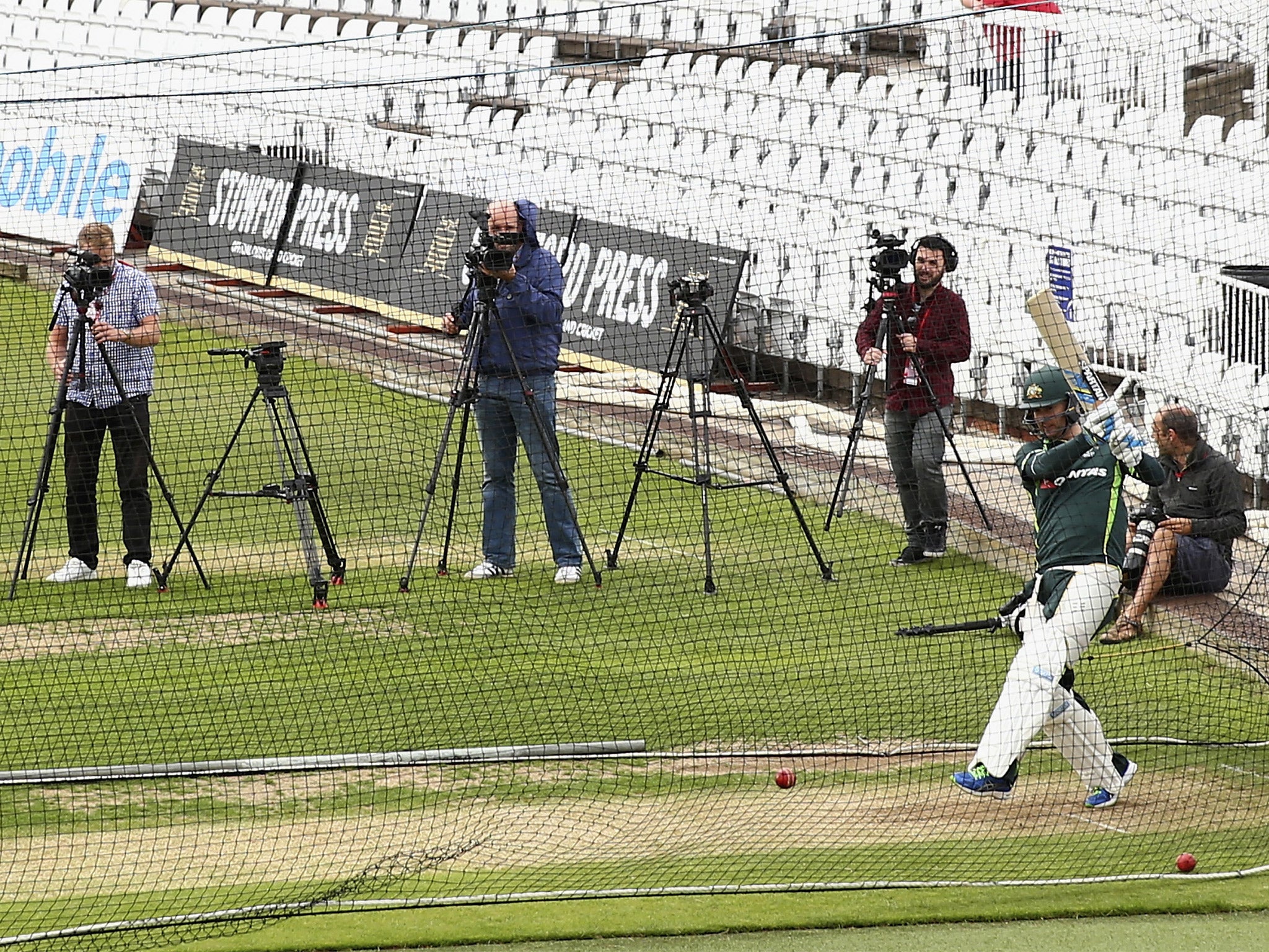 Michael Clarke bats in the Trent Bridge nets under the close scrutiny of the media