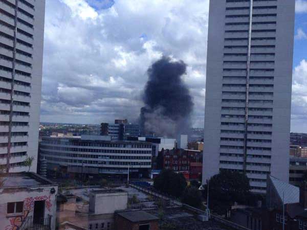 Smoke can be seen billowing over Birmingham