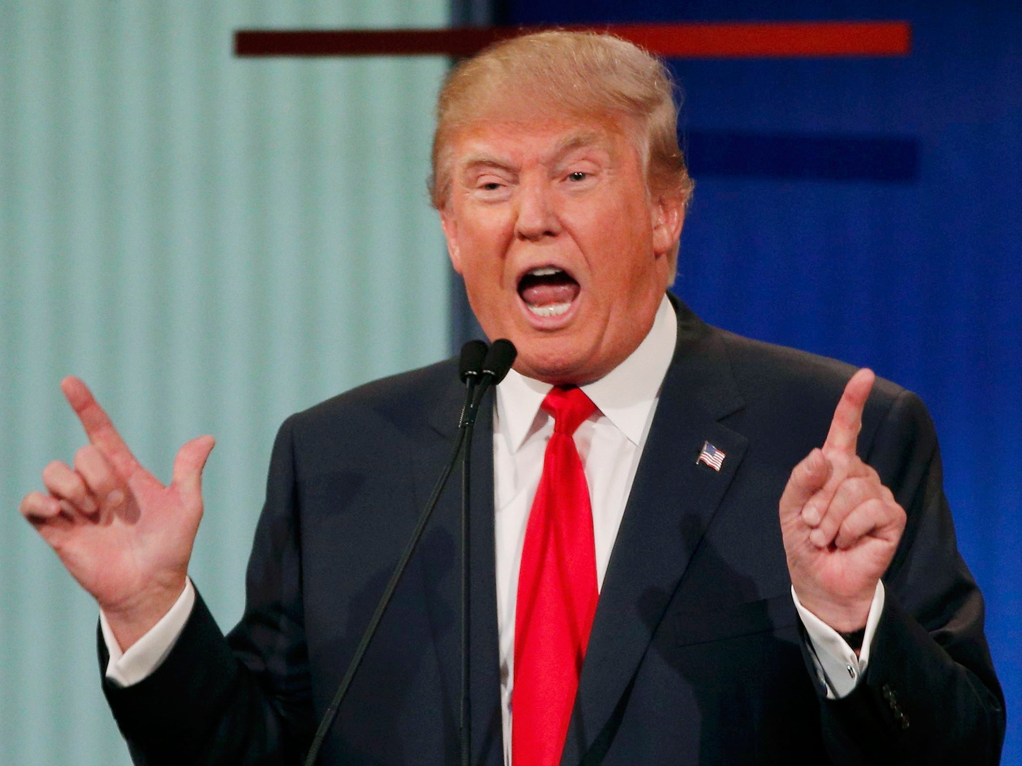 Republican 2016 U.S. presidential candidate businessman Donald Trump answers a question at the first official Republican presidential candidates debate of the 2016 U.S. presidential campaign in Cleveland, Ohio