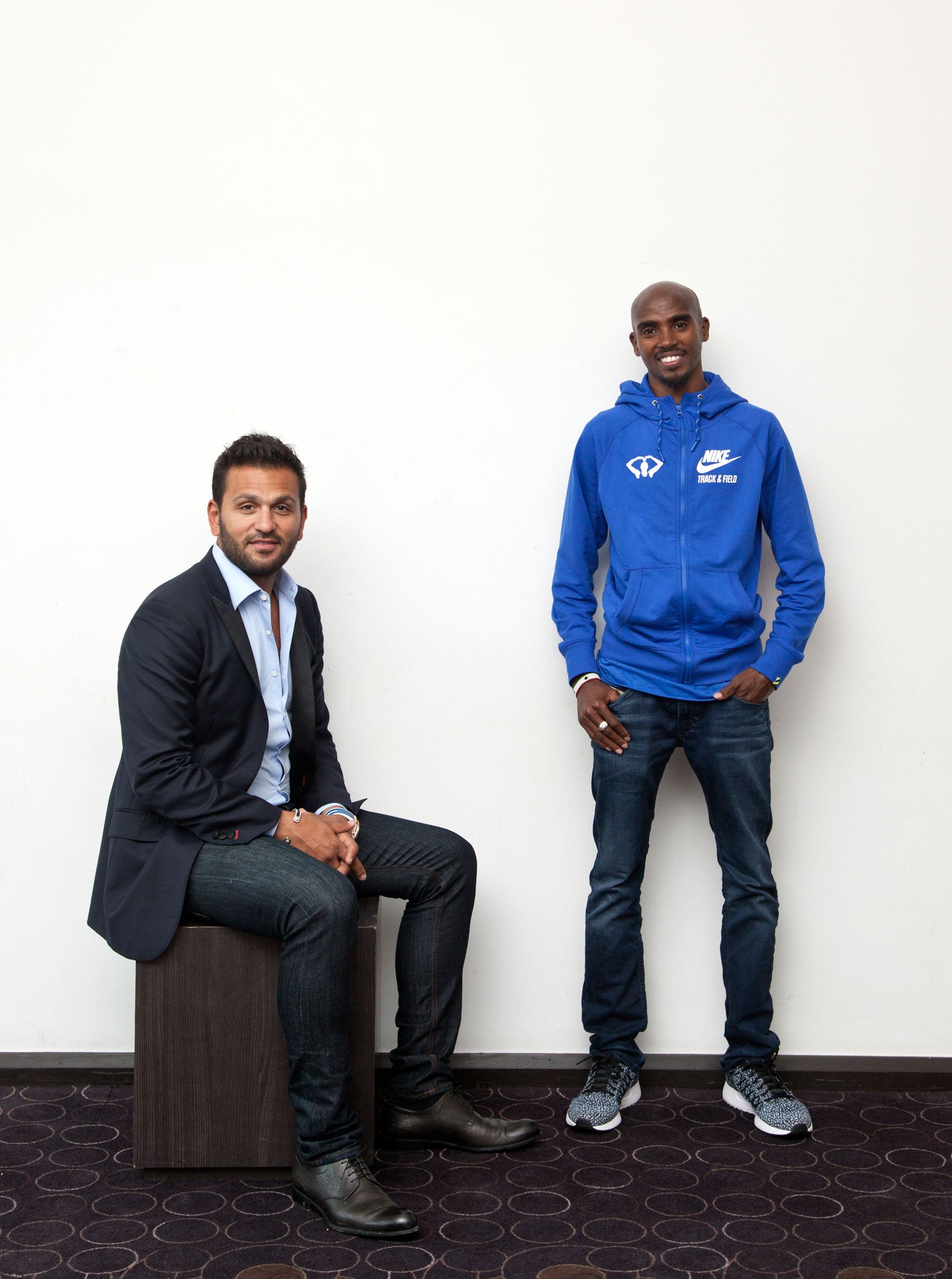 Farah, right, says: 'We lead very different lives: now when I text him that I've done a 20-mile run on a Sunday morning, he'll say, 'Man, how do you do it?''