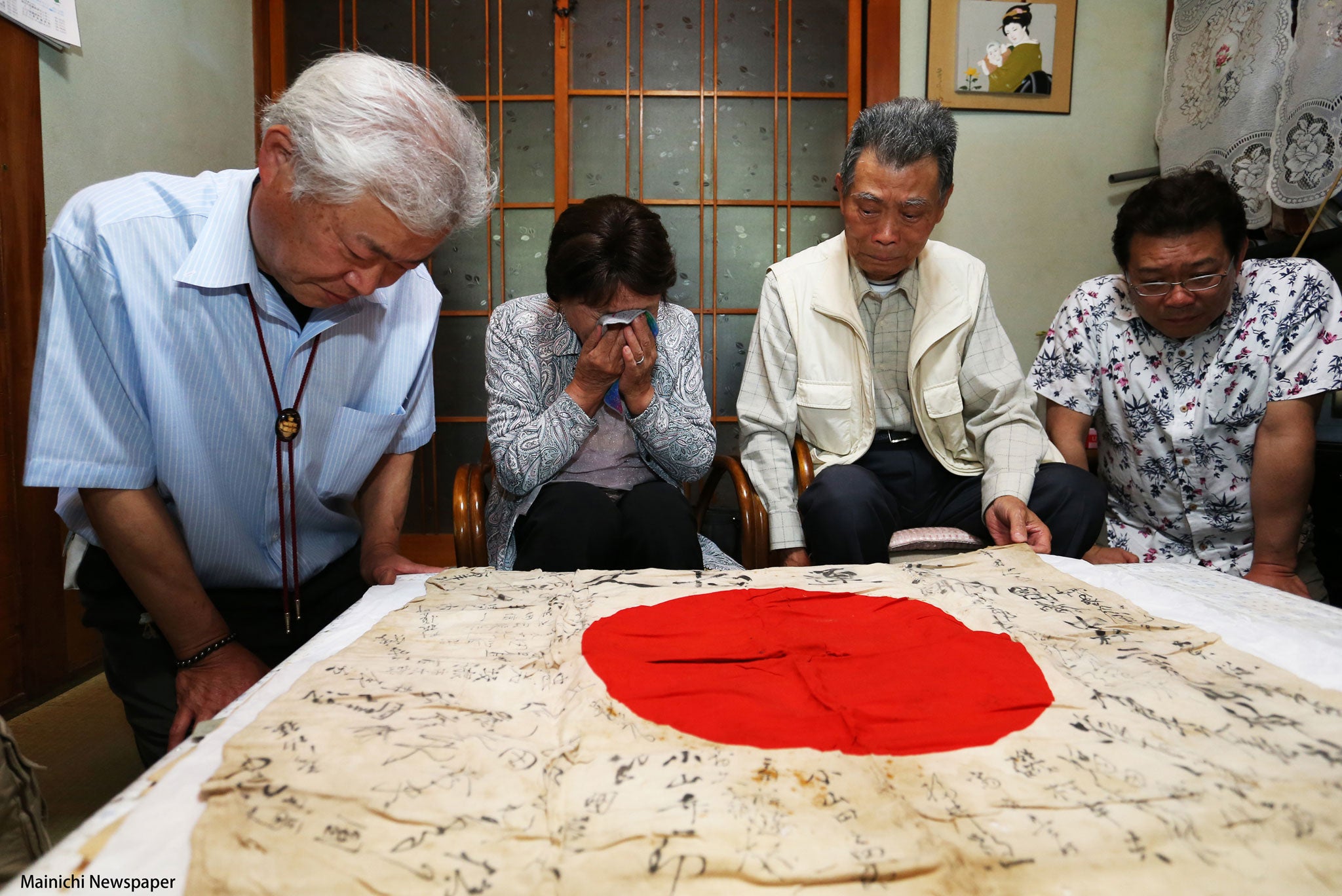 Susumu Handa's nephew Norio Handa, sister and two further family members