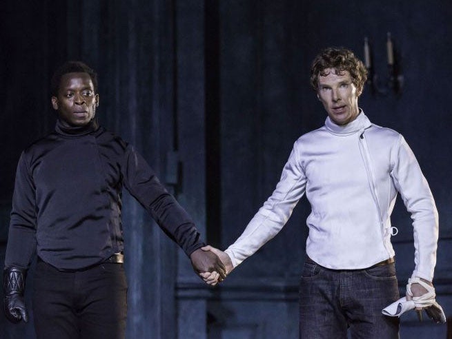 Kobna Holdbrook-Smith as Laertes and Benedict Cumberbatch as Hamlet in the production of Hamlet at the Barbican centre, London.