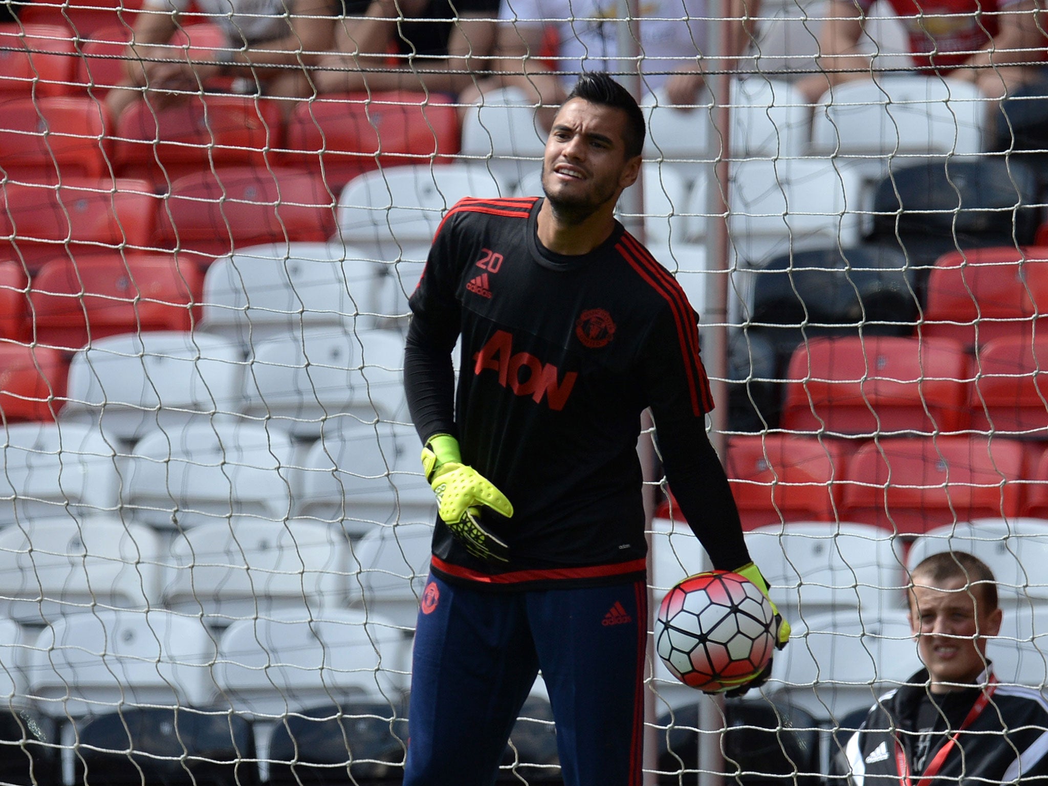 Sergio Romero warms up