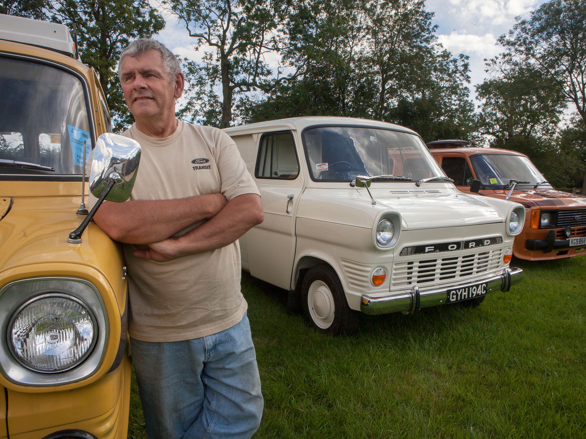 Peter Lee with his collection of model Transits (above) and with three of his 13 full-sized versions