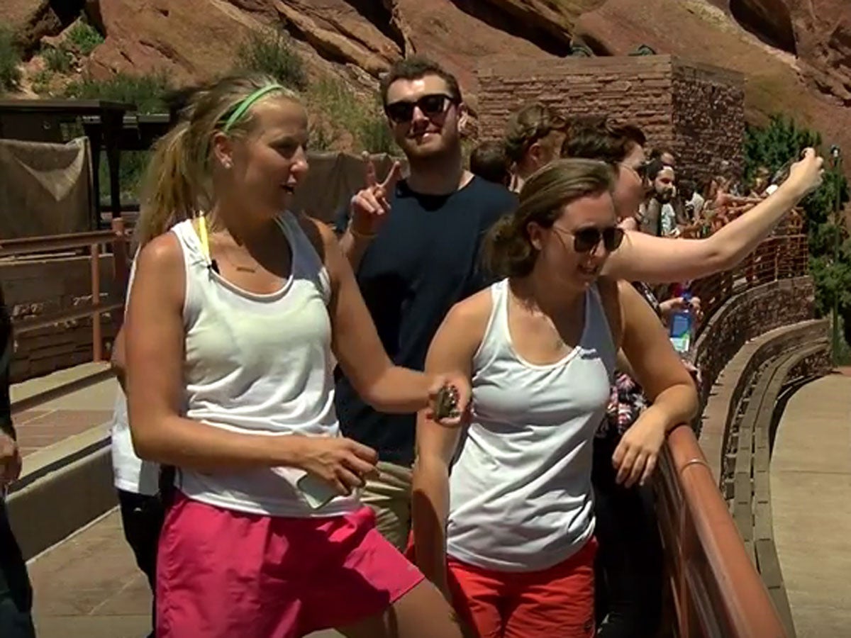 The reporter for ABC7 news station can be herd telling the women that they are “getting photobombed”