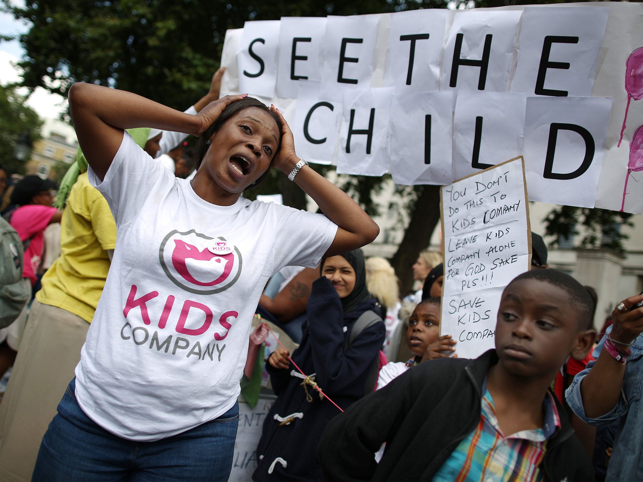 A member of staff from the Kids Company charity pleads for its survival during a rally near Downing Street earlier this month