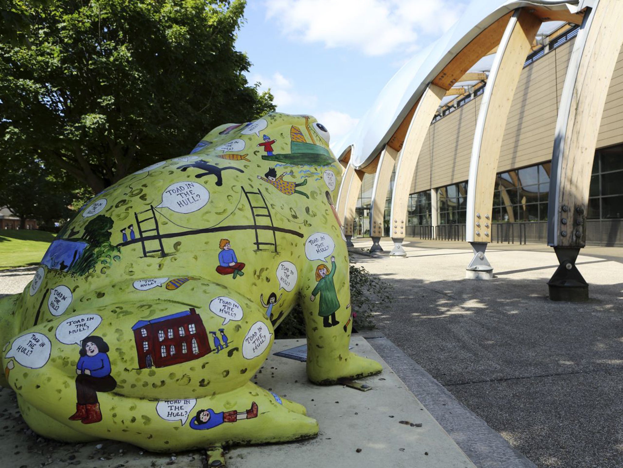 Toad statue by Hull History Centre in Hull, England. The toad is one of the 'Larkin with Toads' project, celebrating the life and work of Philip Larkin (1922 - 1985), the poet, author, jazz critic and librarian.