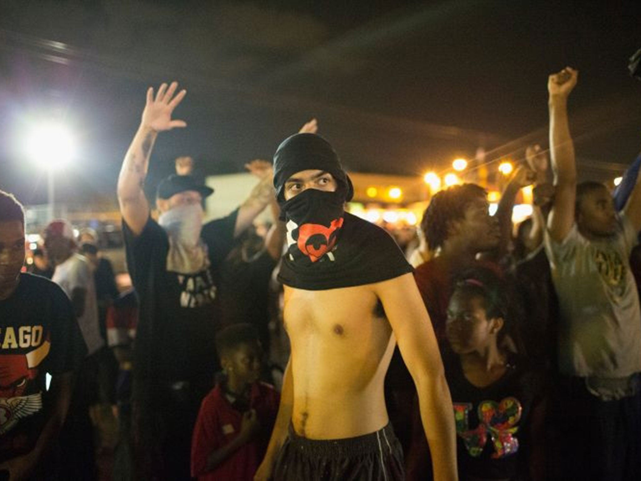 A masked protester