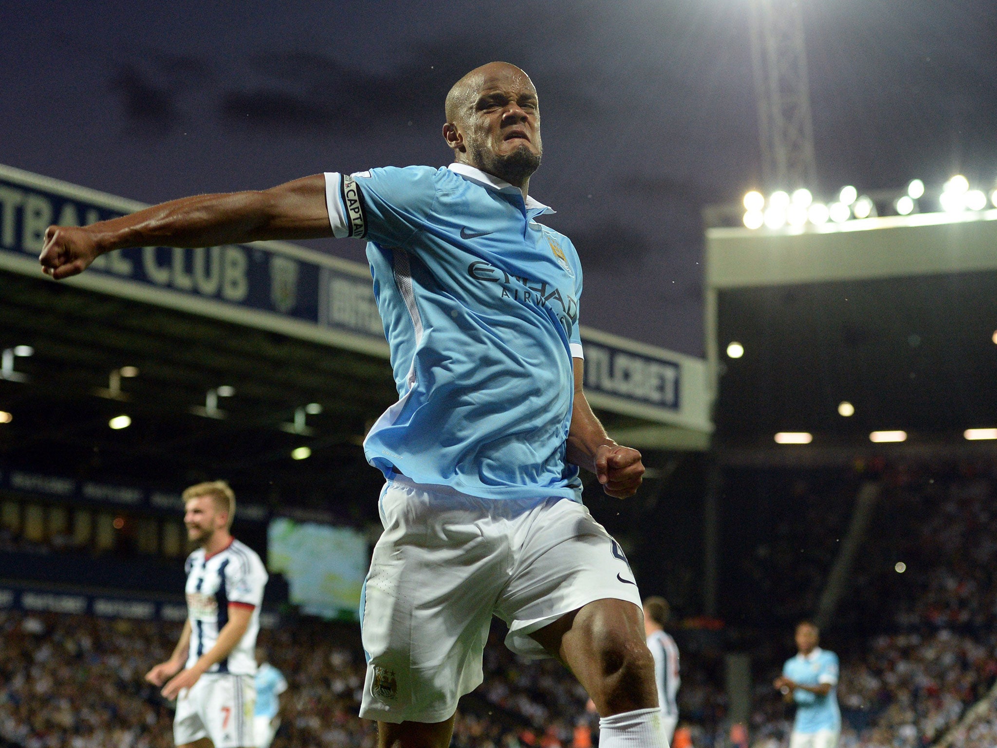 Vincent Kompany celebrates his goal against West Brom