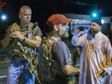 Oath Keepers: Who are white militia at Ferguson protests and why are they allowed to carry guns?