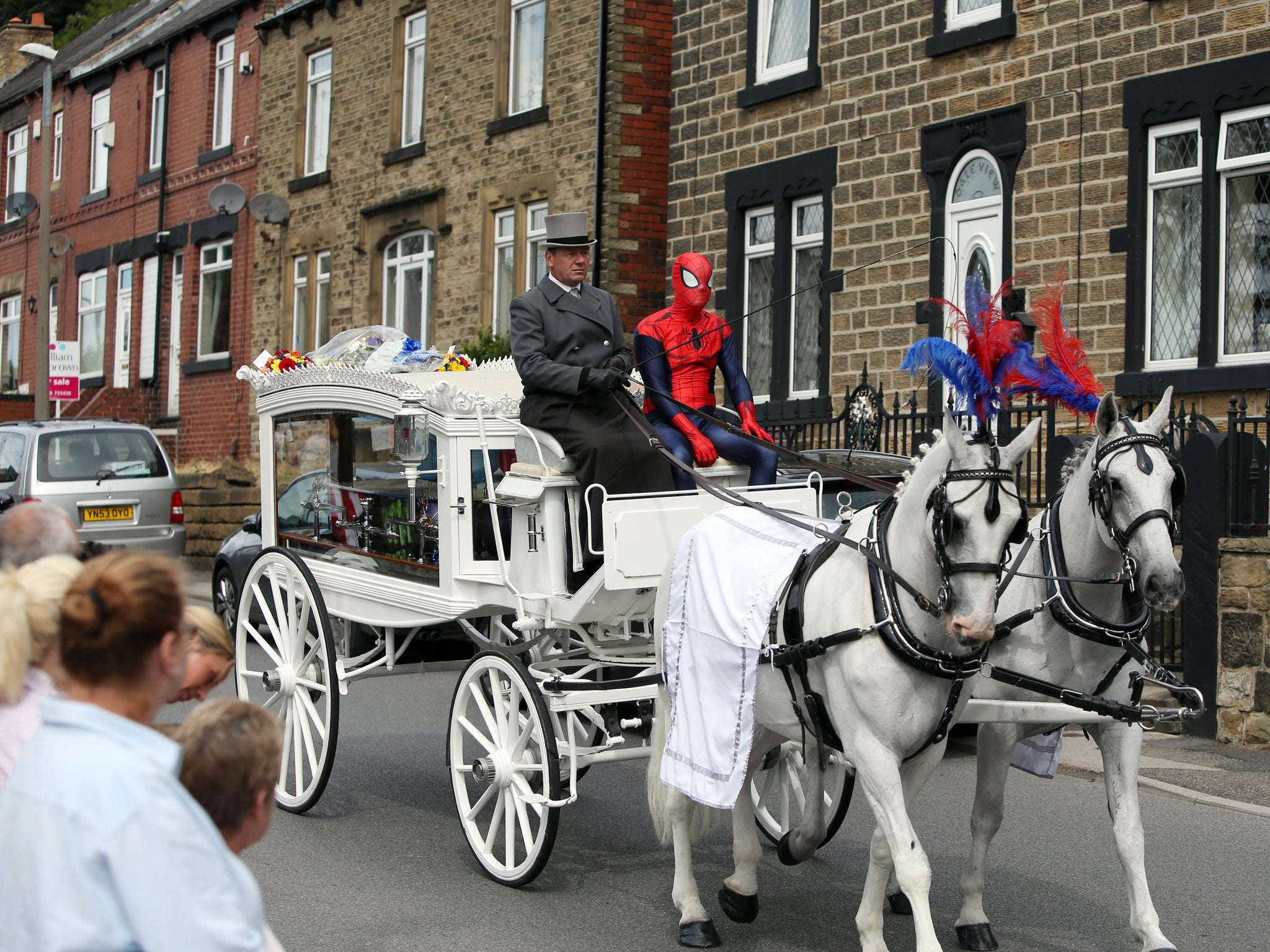 The coffin of seven year old Conley Thompson arriving at St Thomas and St James Church in Worsbrough Dale where his funeral is taking place