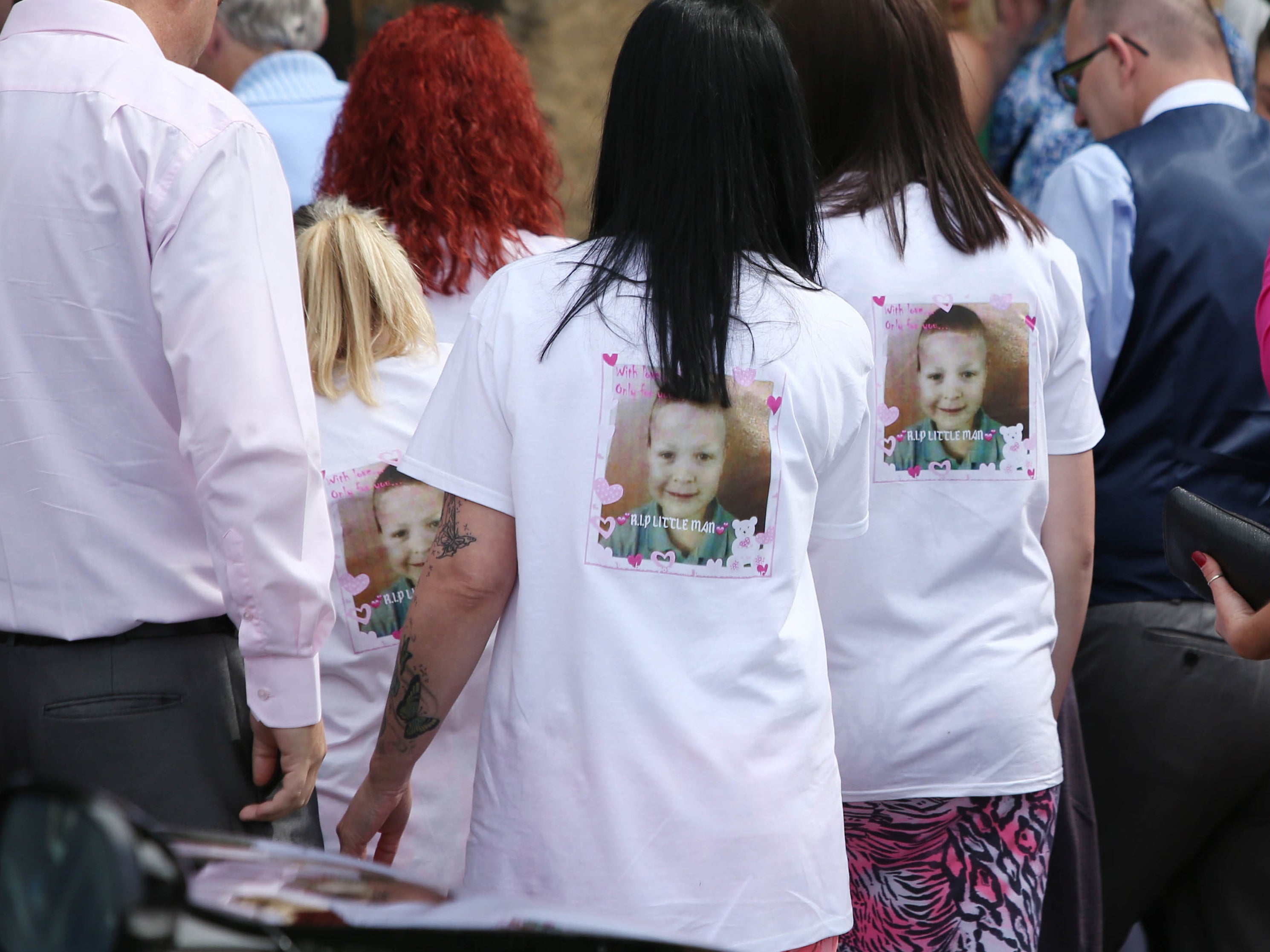 Mourners outside St Thomas and St James Church in Worsbrough Dale before the funeral of seven year year old Conley Thompson.