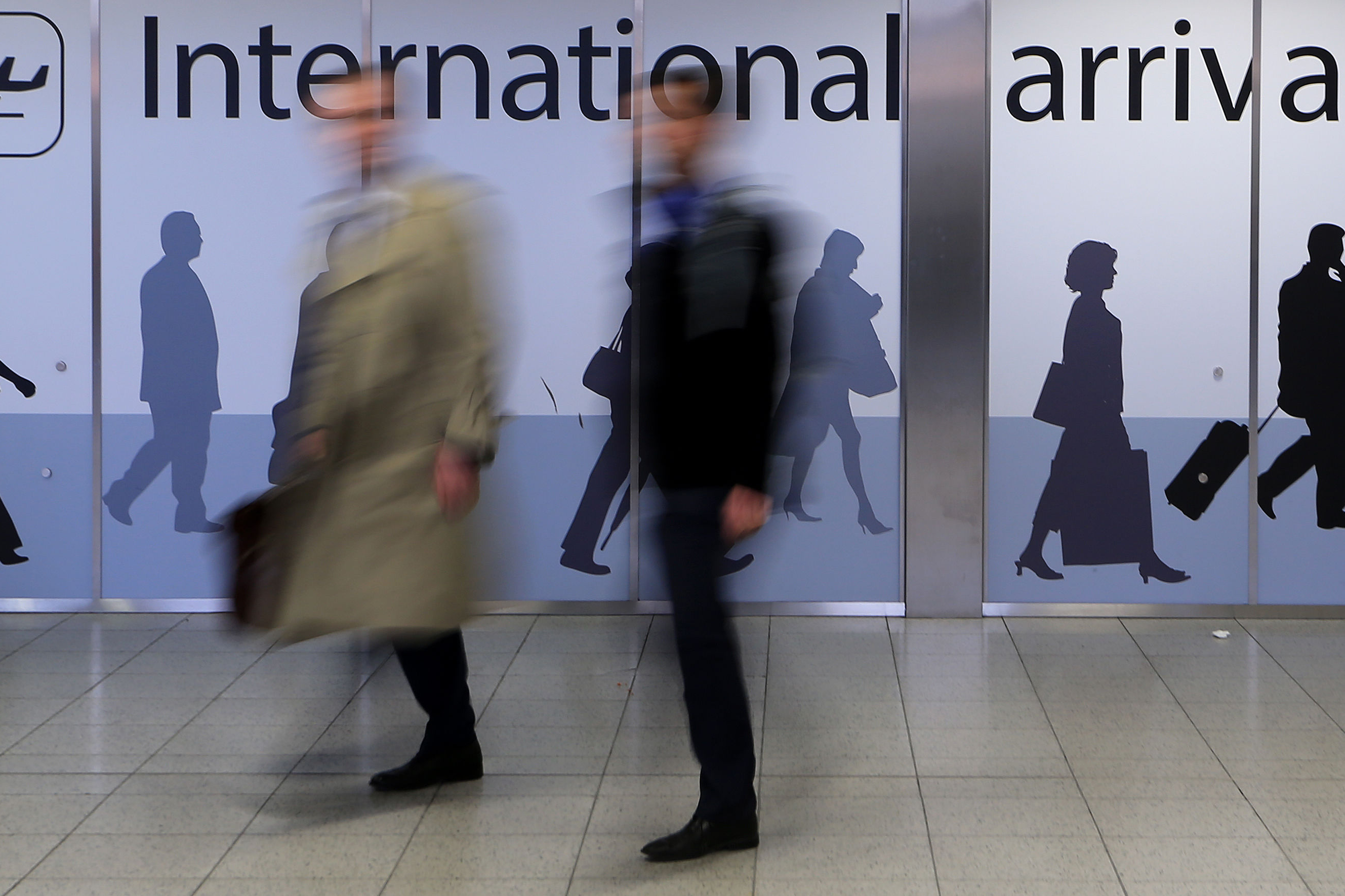 Passengers arrive at Gatwick Airport