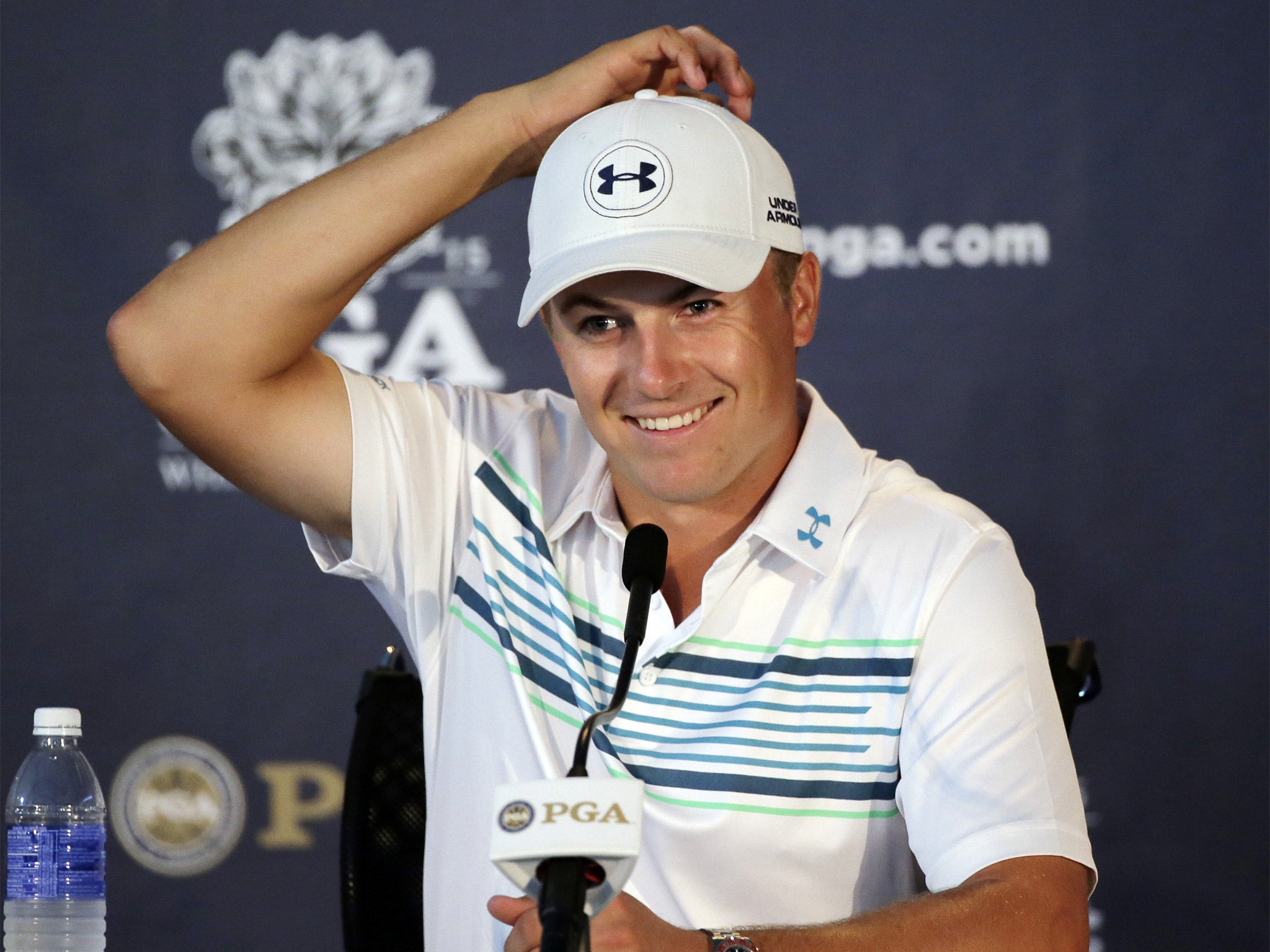 Jordan Spieth, pictured, will partner Rory McIlroy and Zach Johnson