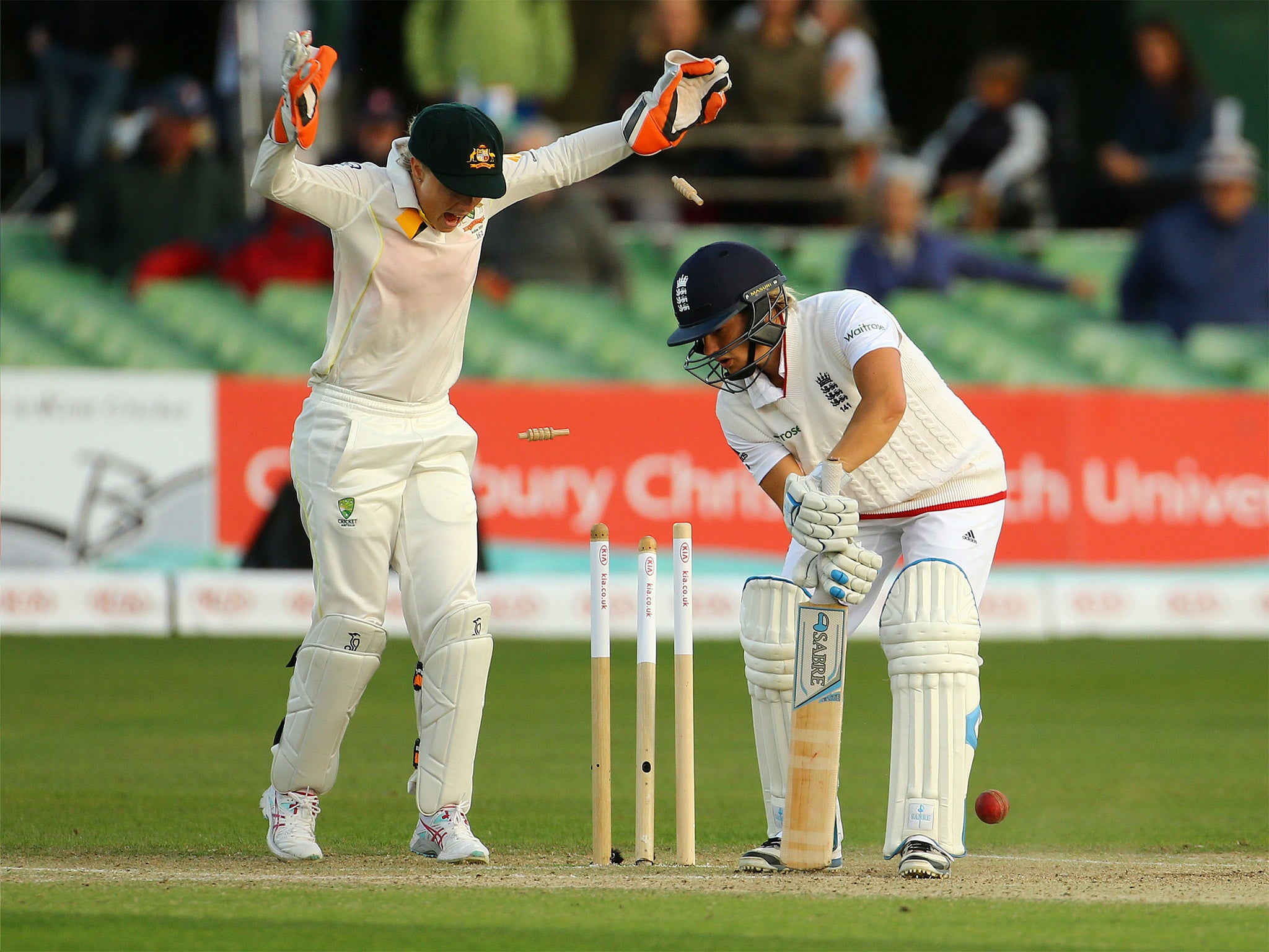 England’s Katherine Brunt is bowled by Sarah Coyte as Australia’s wicketkeeper Alyssa Healy looks on