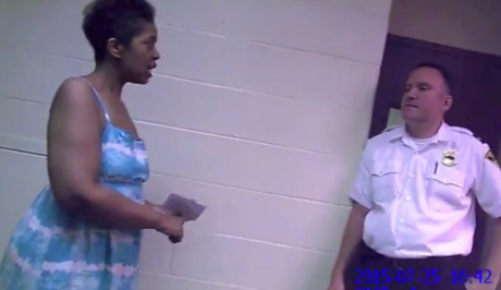 Ralkina Jones, left, is shown in body camera footage telling a Cleveland Heights officer that she is worried about her health. (Cleveland Heights Police Department)