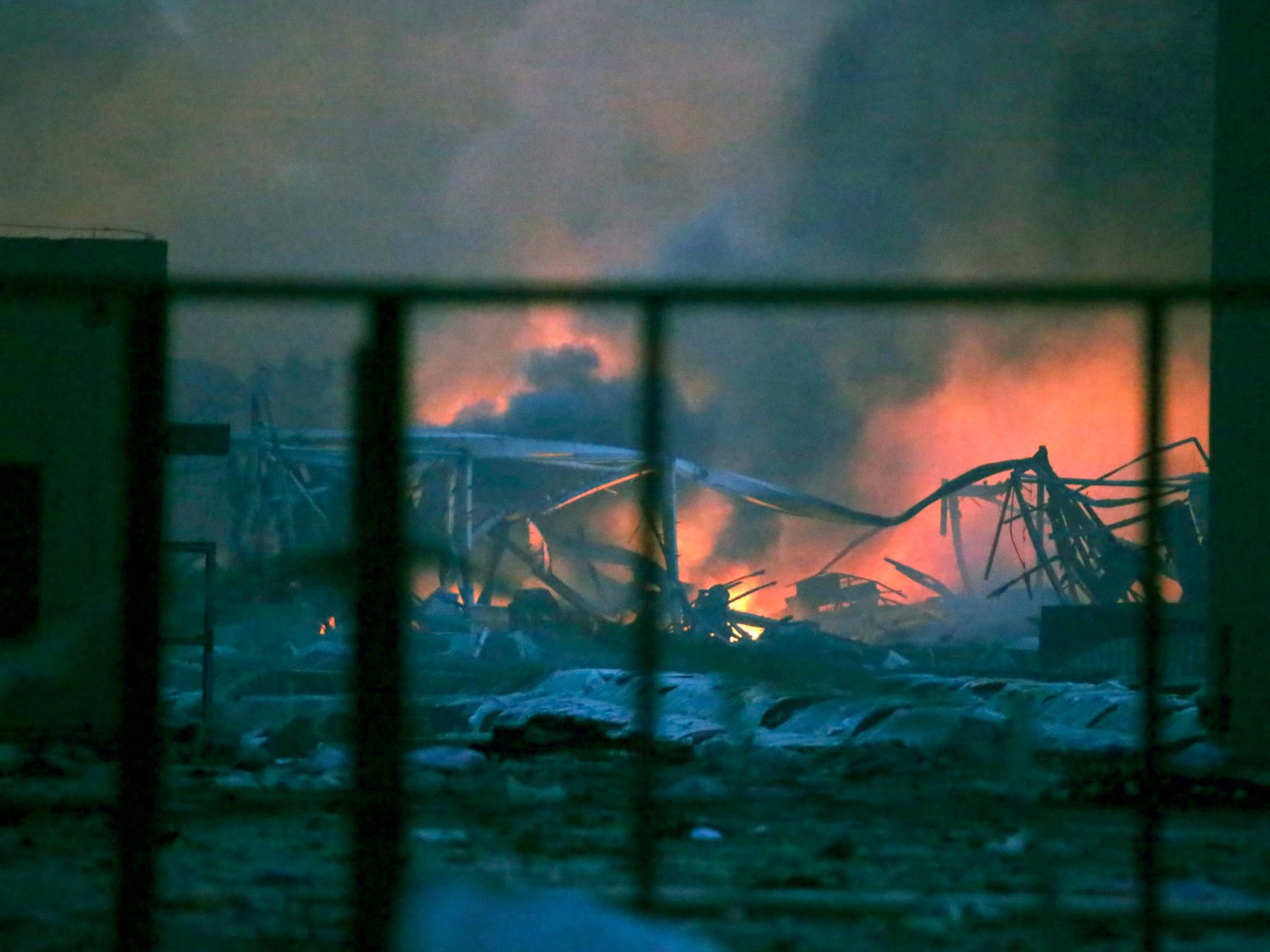 View of the destruction after explosions in the port area of Tianjin, northern China,