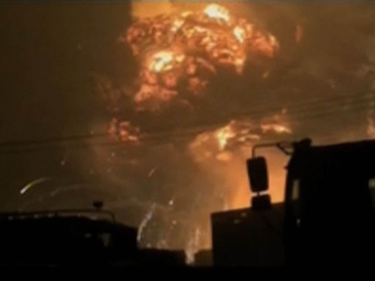 A screen grab from taken from state broadcaster China Central Television (CCTV) footage on August 12, 2015 shows a huge explosion in the northern Chinese port city of Tianjin.