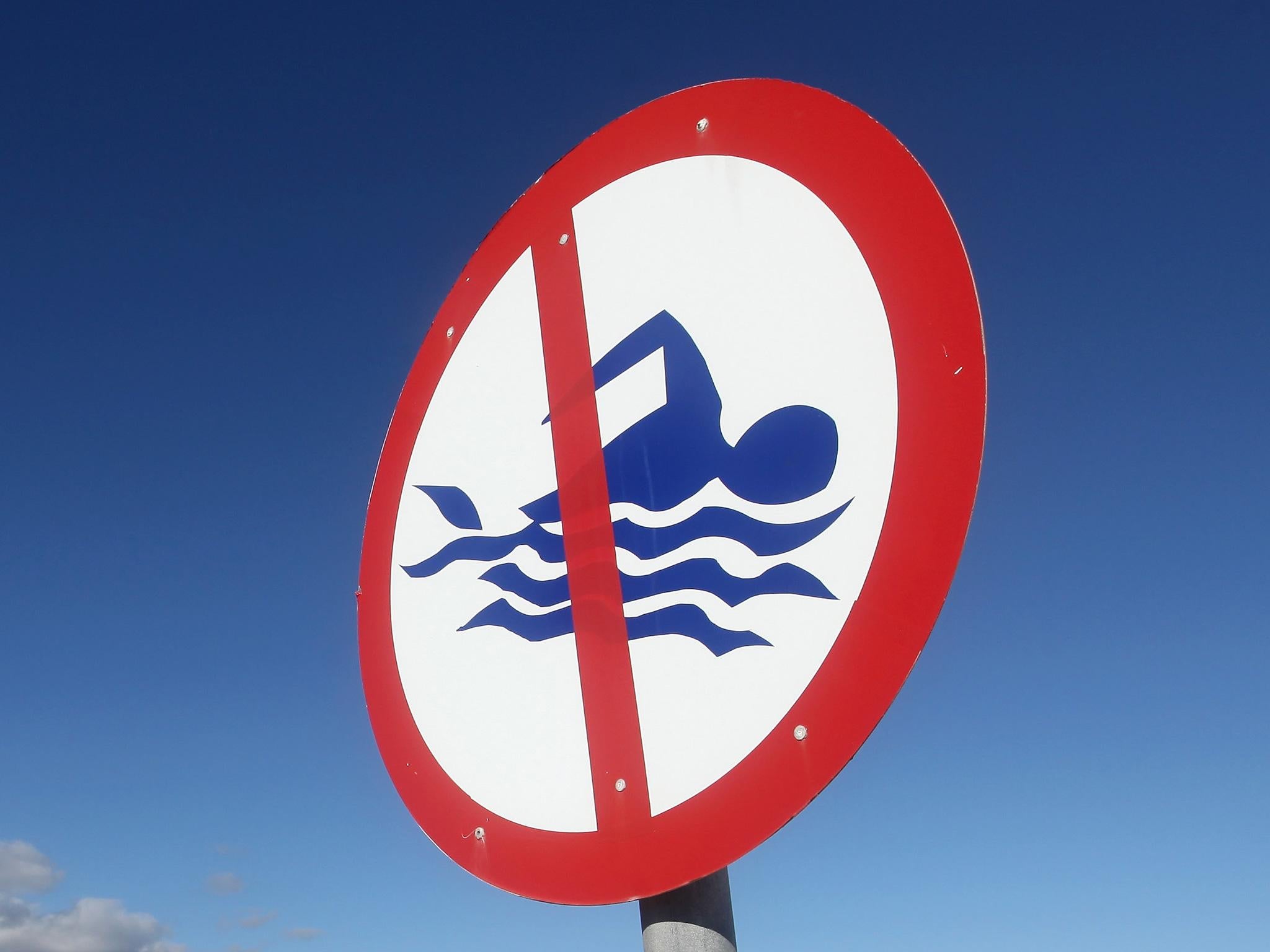 The pair got into difficult in water as members of their family looked on at St Andrews Broad, Norwich