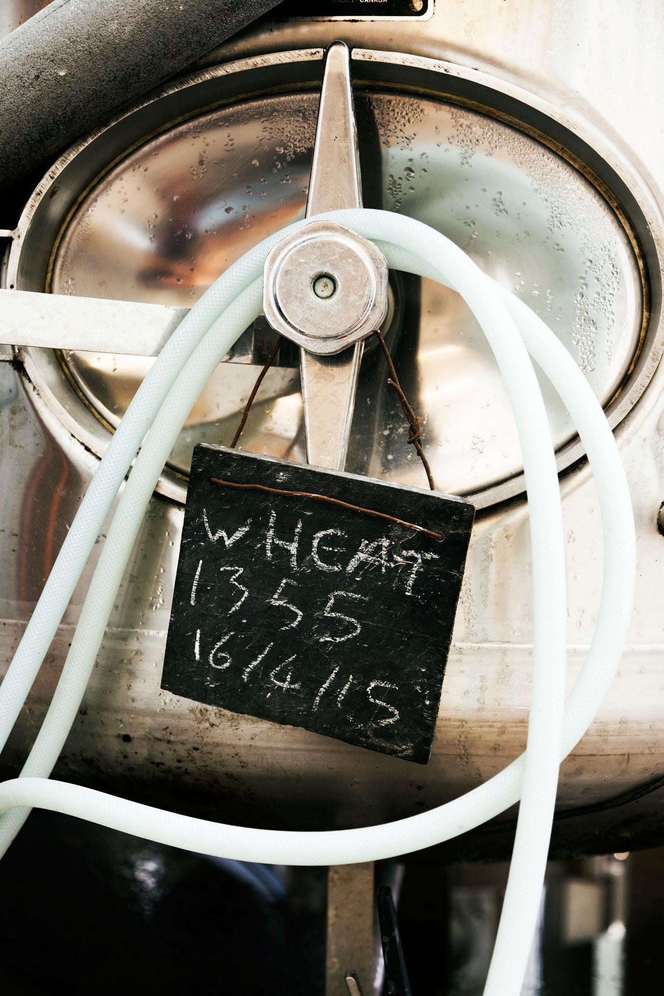 The door of a conditioning tank containing wheat beer