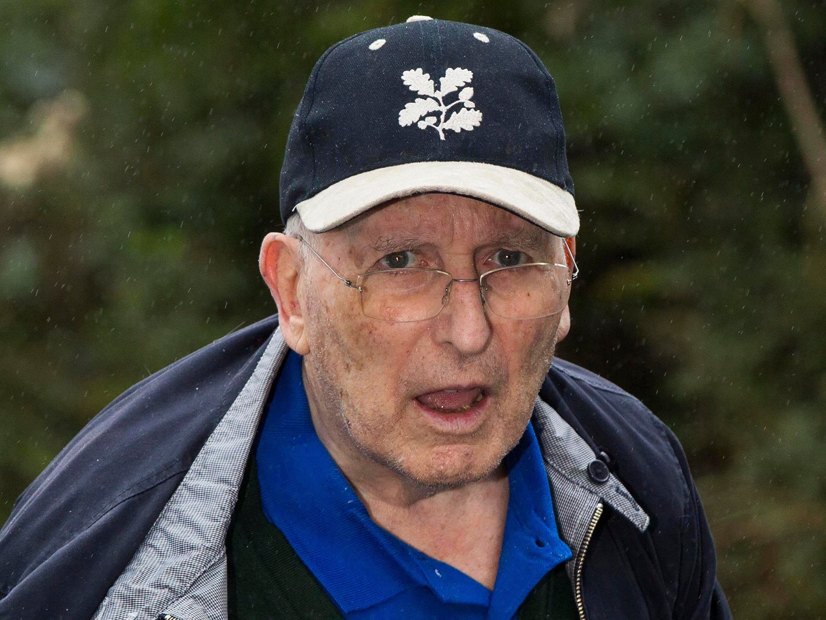 Lord Greville Janner arrives at a house after appearing at Westminster Magistrates' Court in London