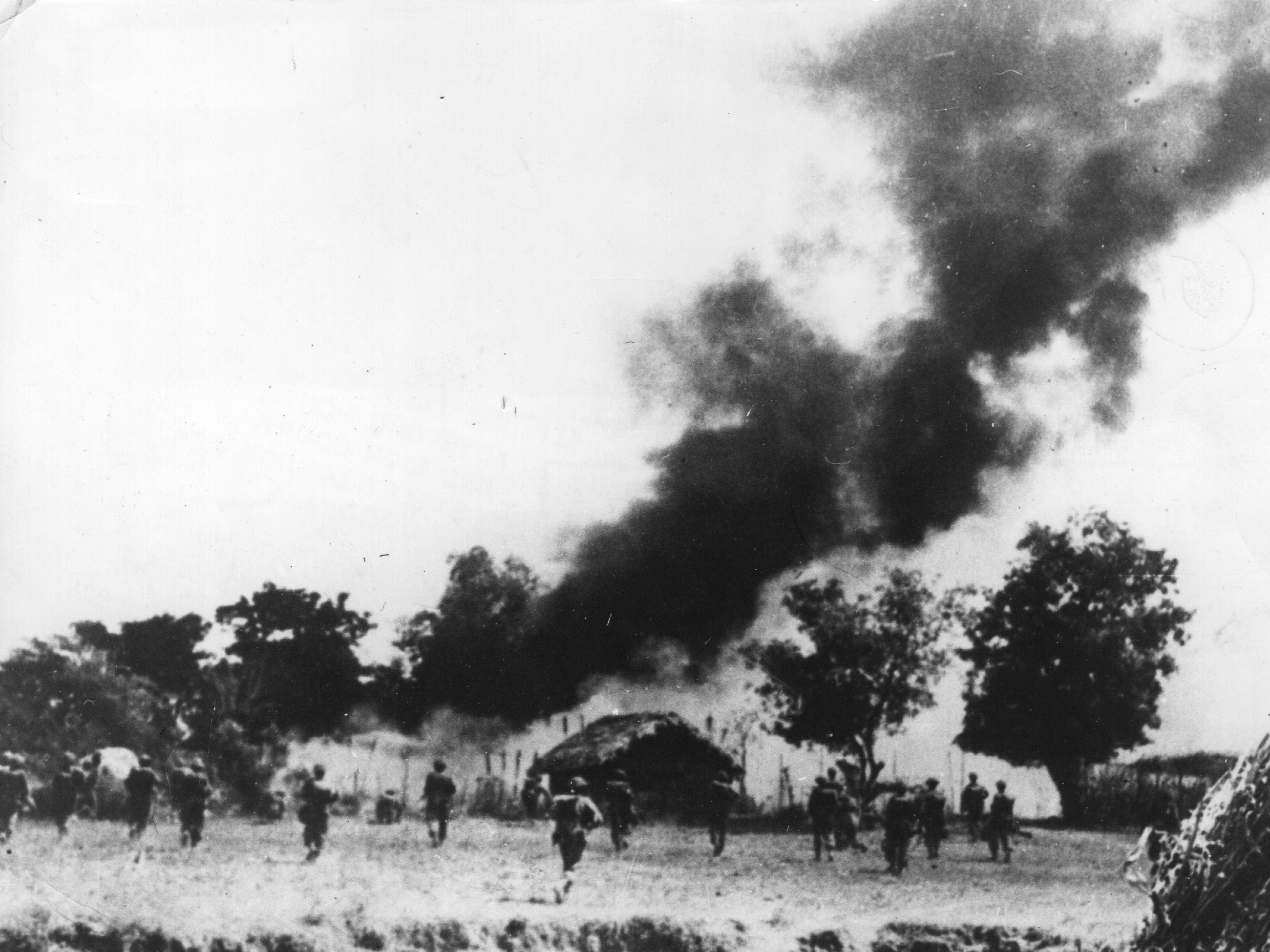 British and Indian Troops advancing on a town 80 miles south of Mandalay.