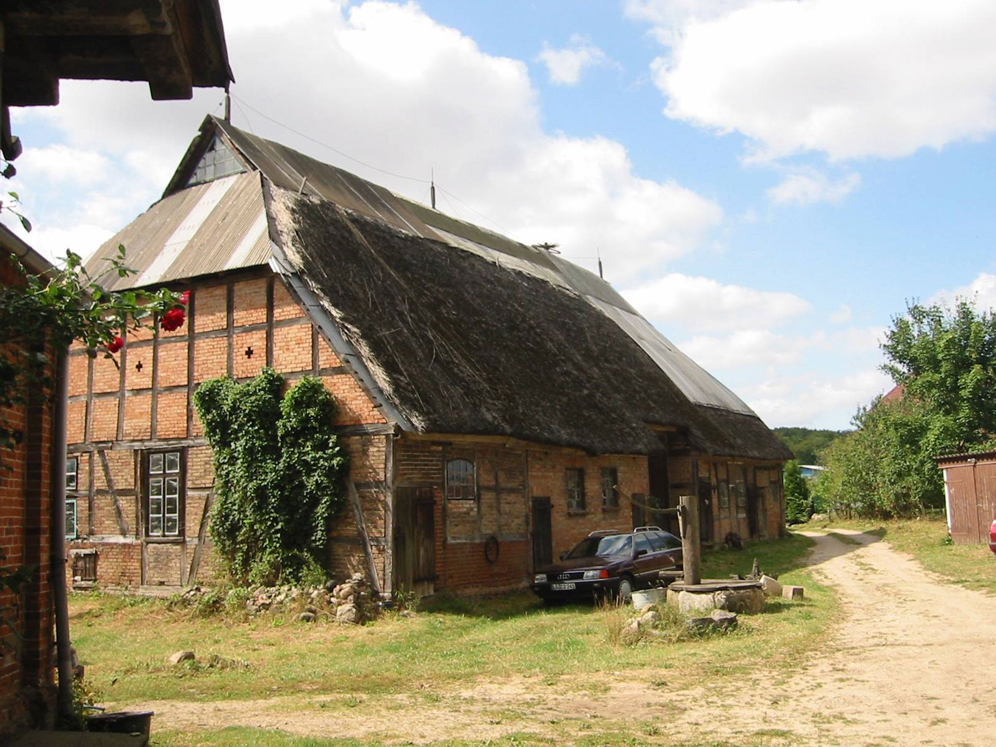 The couple posted this picture to Facebook with caption: 'Our barn before firing. 160 years, survived two world wars, refugees granted accommodation, destroyed within 20 minutes'