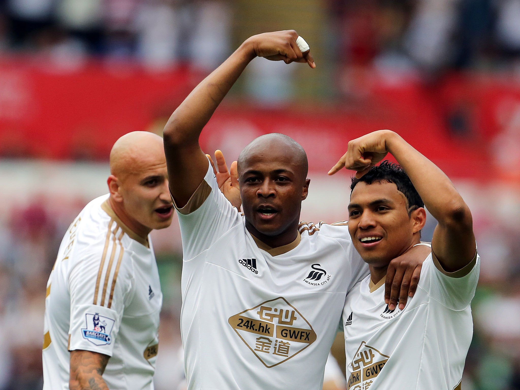 Ayew and Jefferson Montero celebrate the Ghanaian's strike