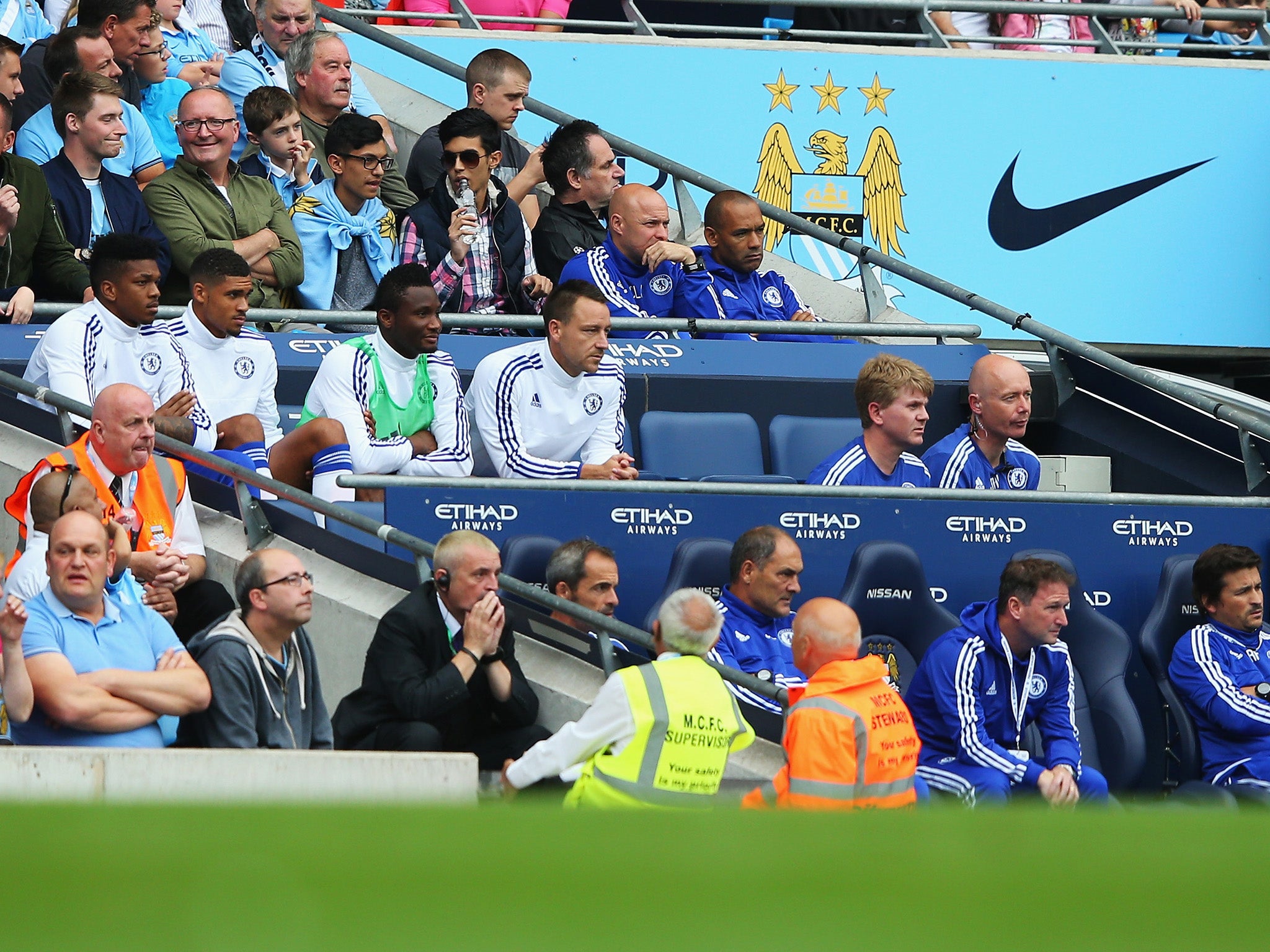 John Terry looks on after his half-time substitution