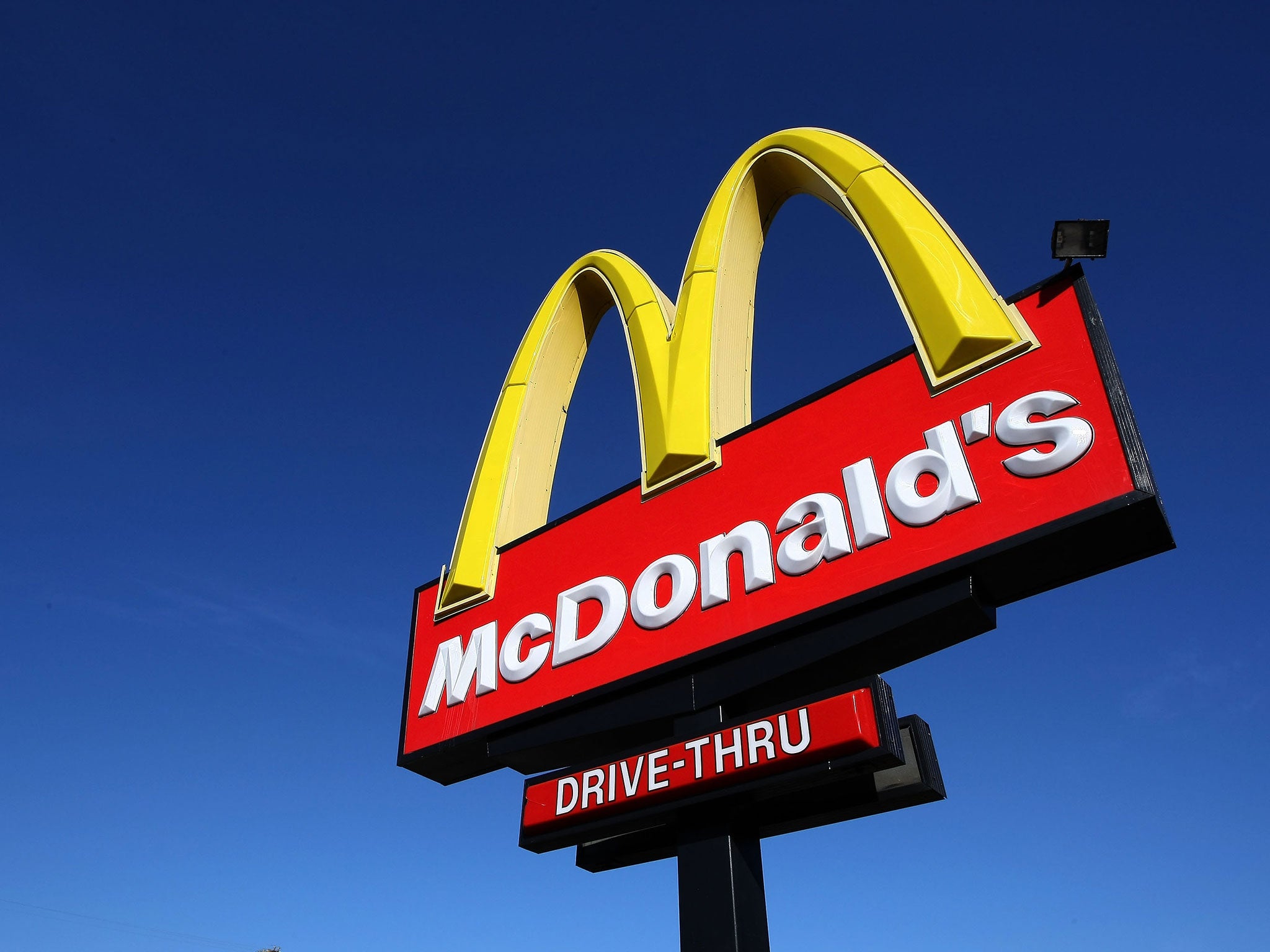 A sign stands outside of a McDonald's restaurant February 9, 2009 in San Francisco, California. Fast food chain restaurant McDonald's reported a 7.1 percent increase in same store sales for January as people look towards cheaper food alternatives in the weakening economy.