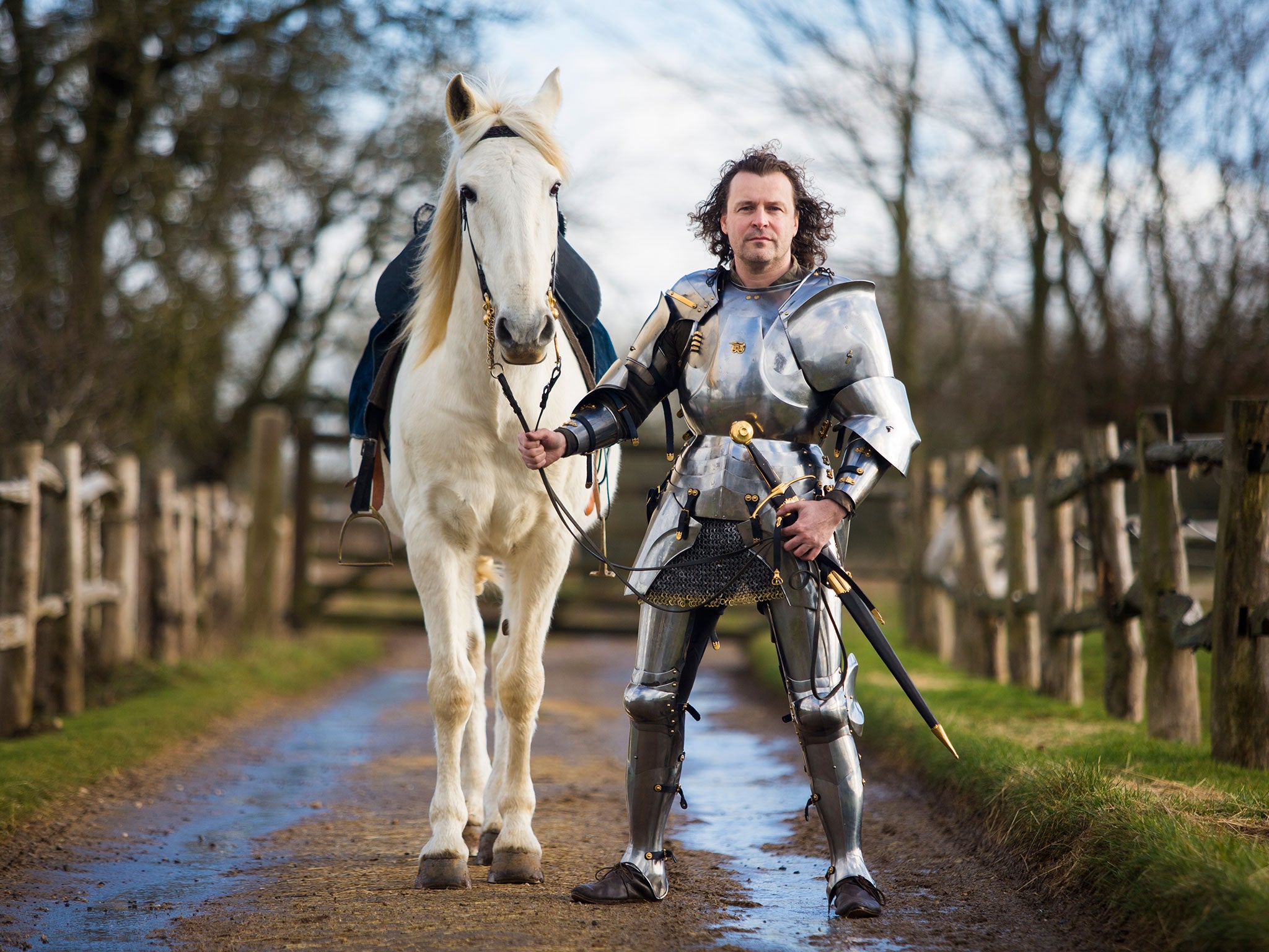 Jason Kingsley, the co-founder of Rebellion computer games, is a battle re-enactor. He is pictured here with his horse Warlord