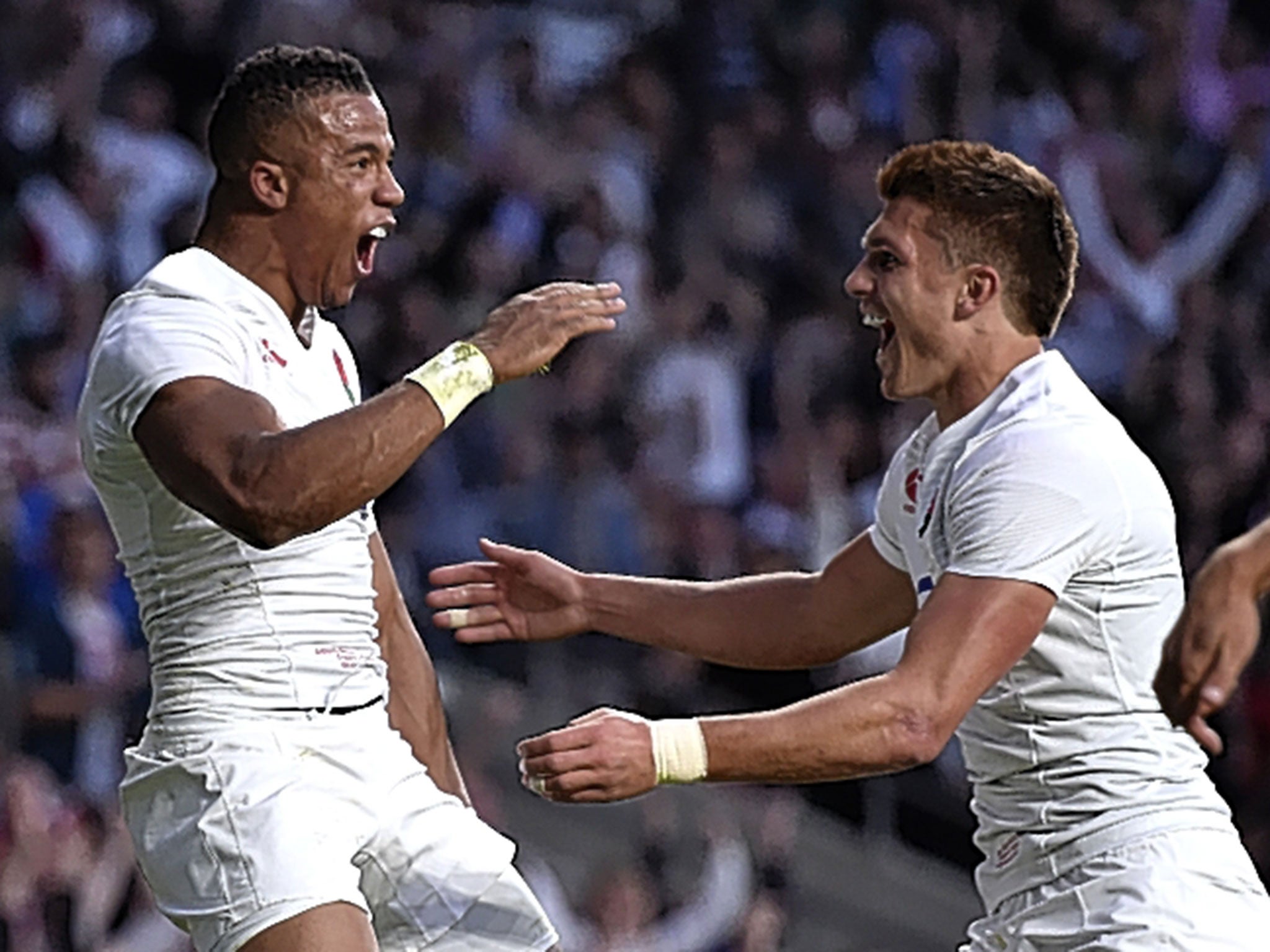 Henry Slade celebrates with Anthony Watson after setting up the wing’s opening try