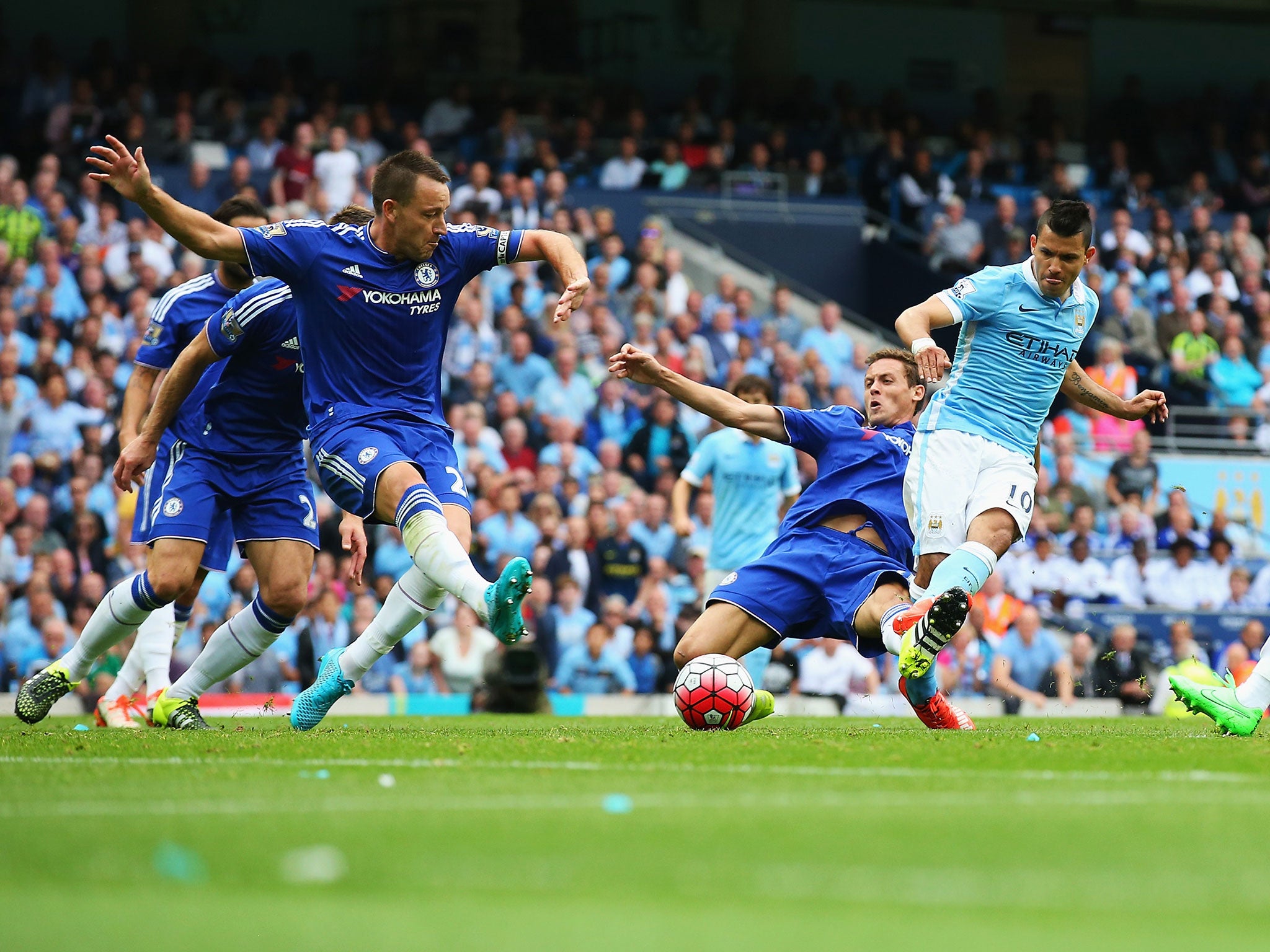 Chelsea captain John Terry, left, cannot stop Sergio Aguero putting Manchester City