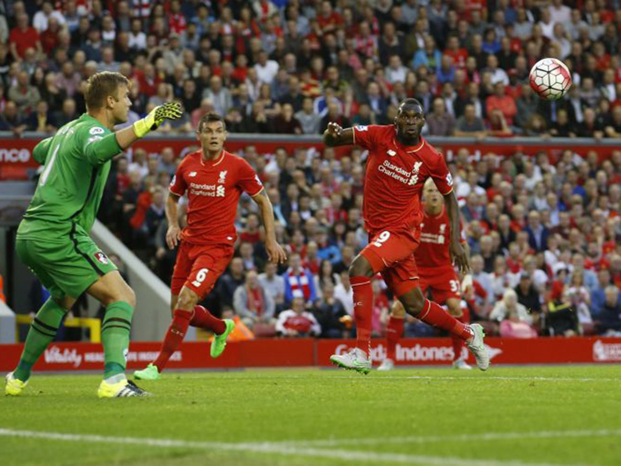 Christian Benteke finishes but Philippe Coutinho (out of shot) should have been ruled offside