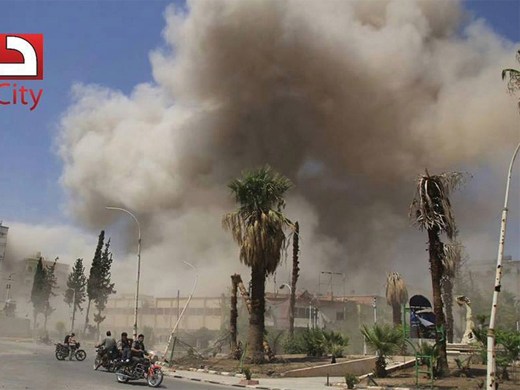 TV footage shows smoke in Douma following the Syrian government airstrike