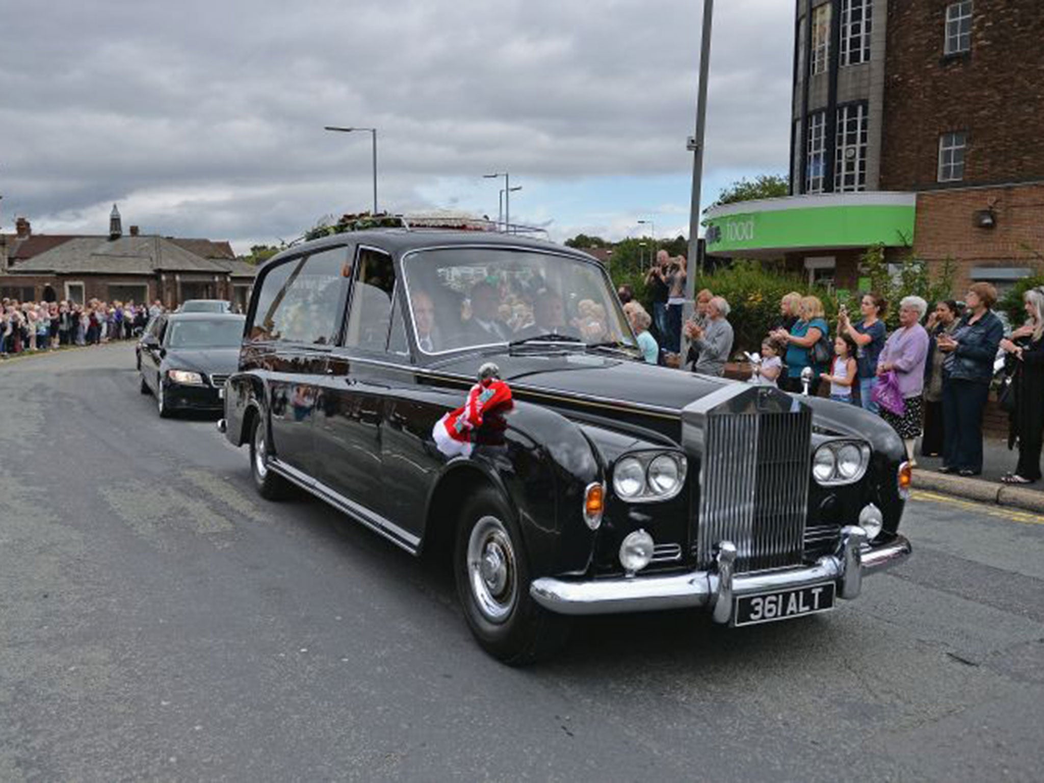 The funeral cortege of Cilla Black leaves B Jenkins and Son as it makes its way to St Mary's RC Church (Getty)