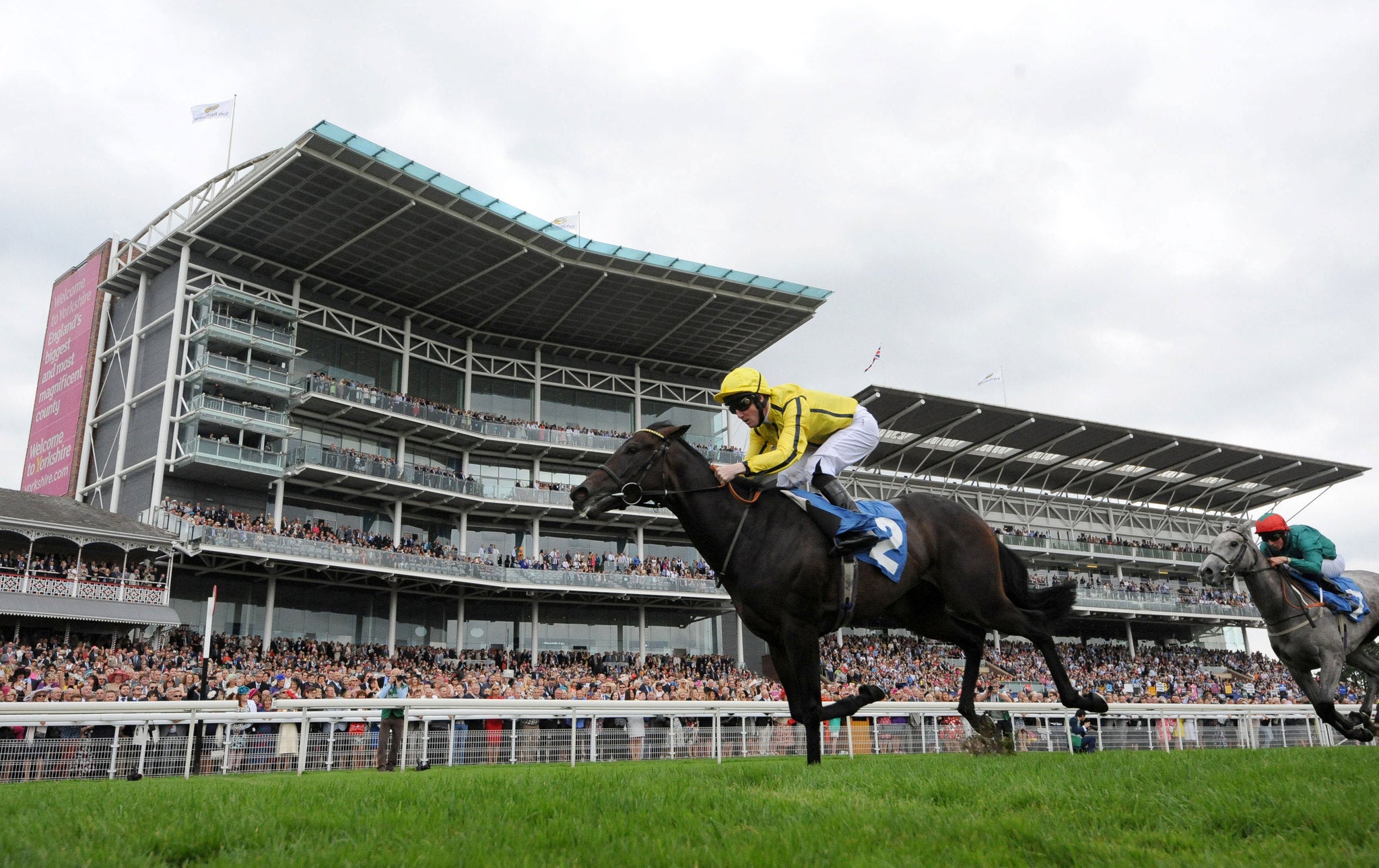 Besharah, ridden by Pat Cosgrave, completes a double at York yesterday for her trainer, William Haggas, in the Lowther Stakes