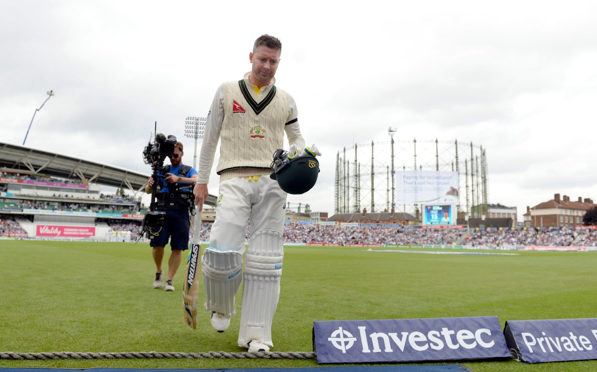 Michael Clarke, playing his last Test match, walks off the field after scoring just 15 runs at The Oval, where Australia reached 287 for 3 by the end of the first day