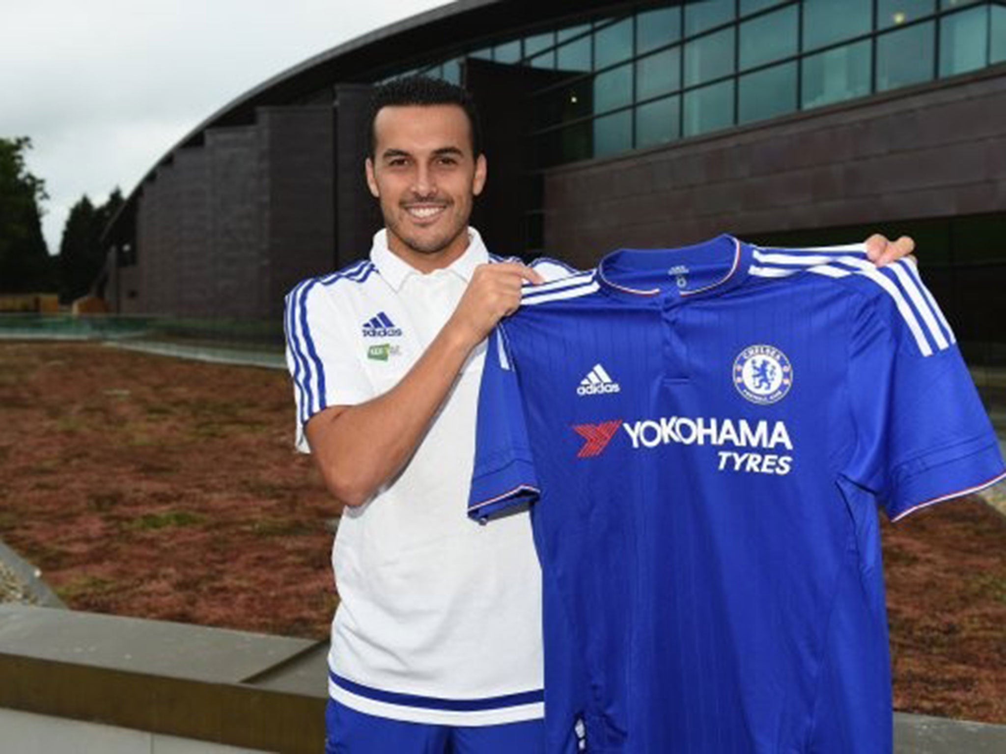 Pedro poses with his new Chelsea shirt